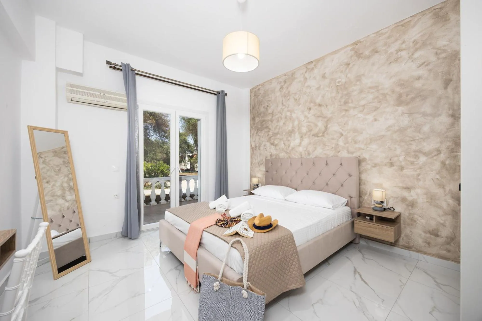 Bed in Kosmas Apartments