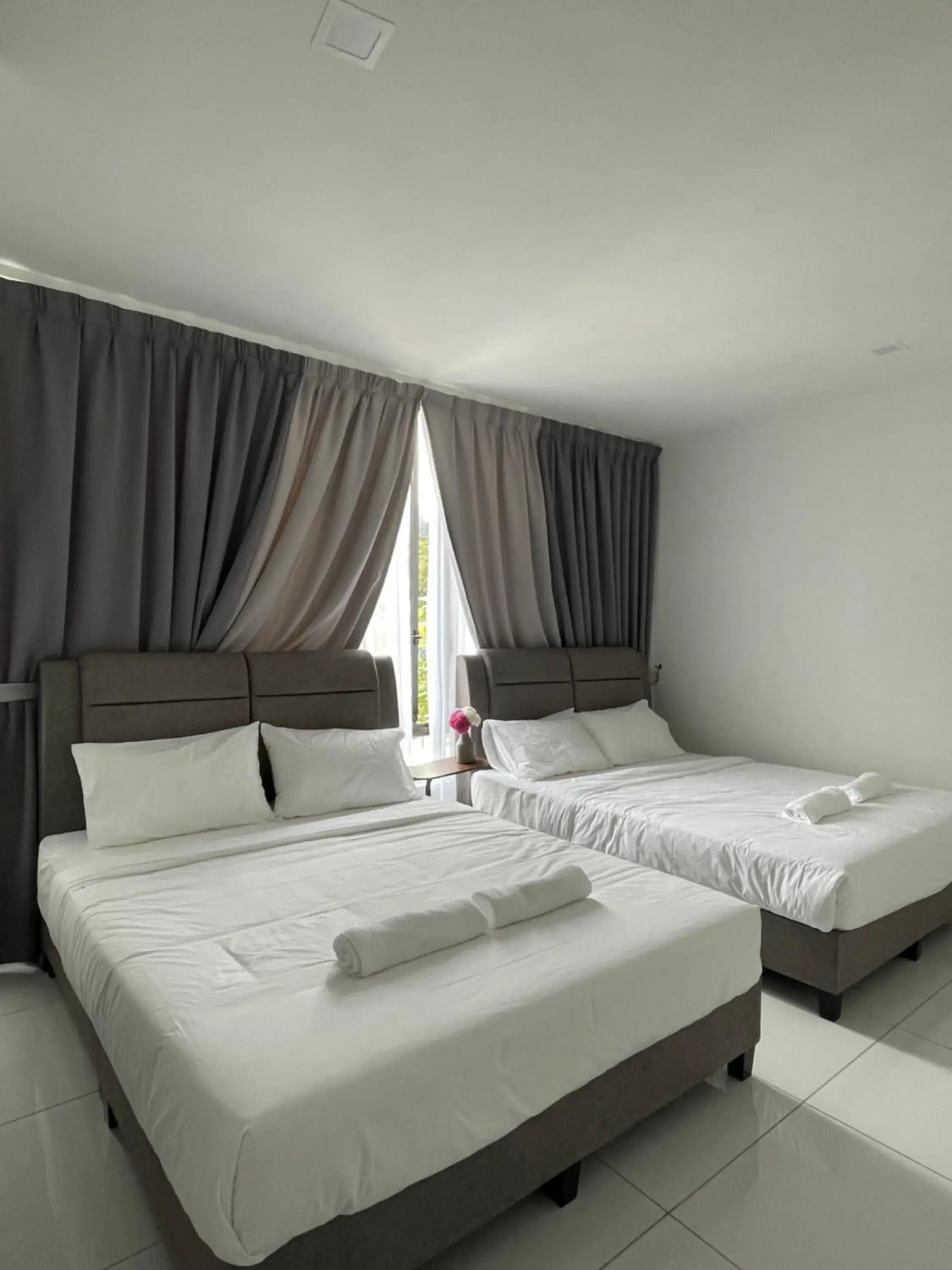 Bed in TDOZE Hotel Bed in TDOZE Hotel