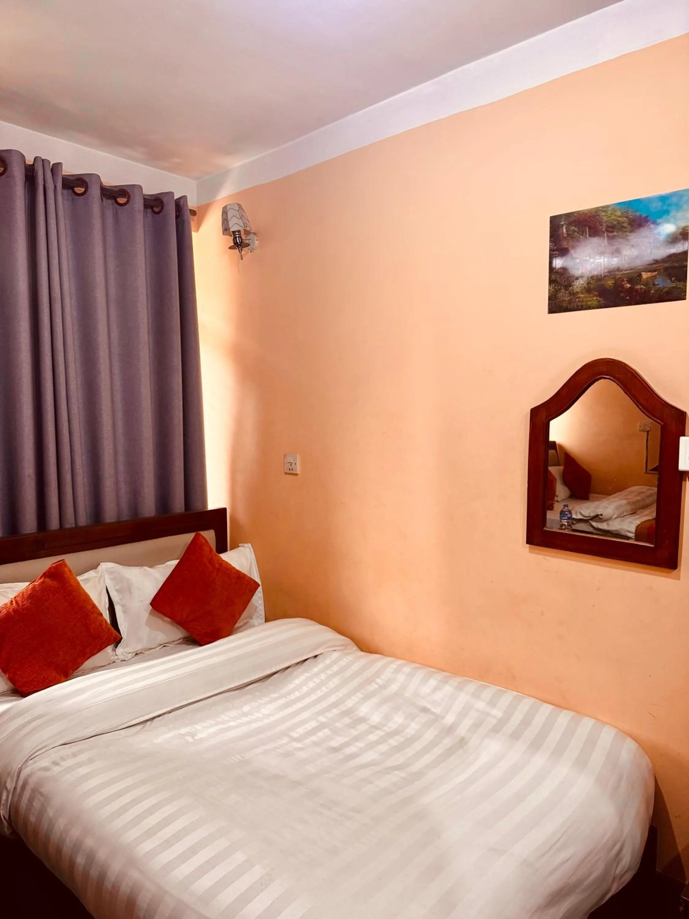 Bed in Om Mandakini Hotel