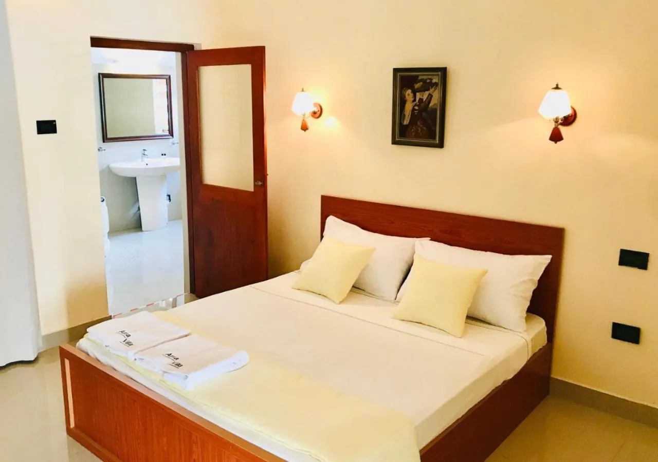 Bed in Ama Villa Negombo