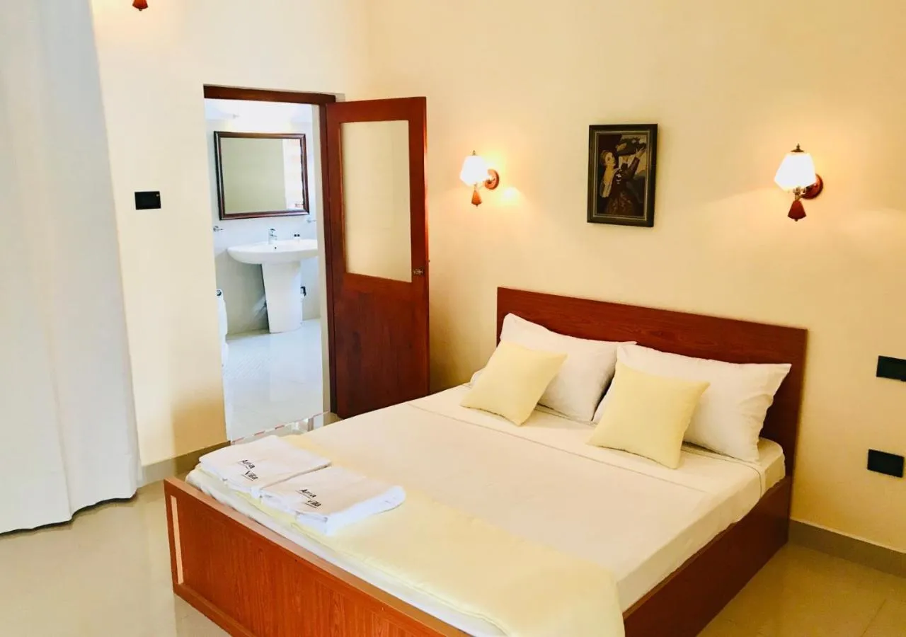 Bed in Ama Villa Negombo