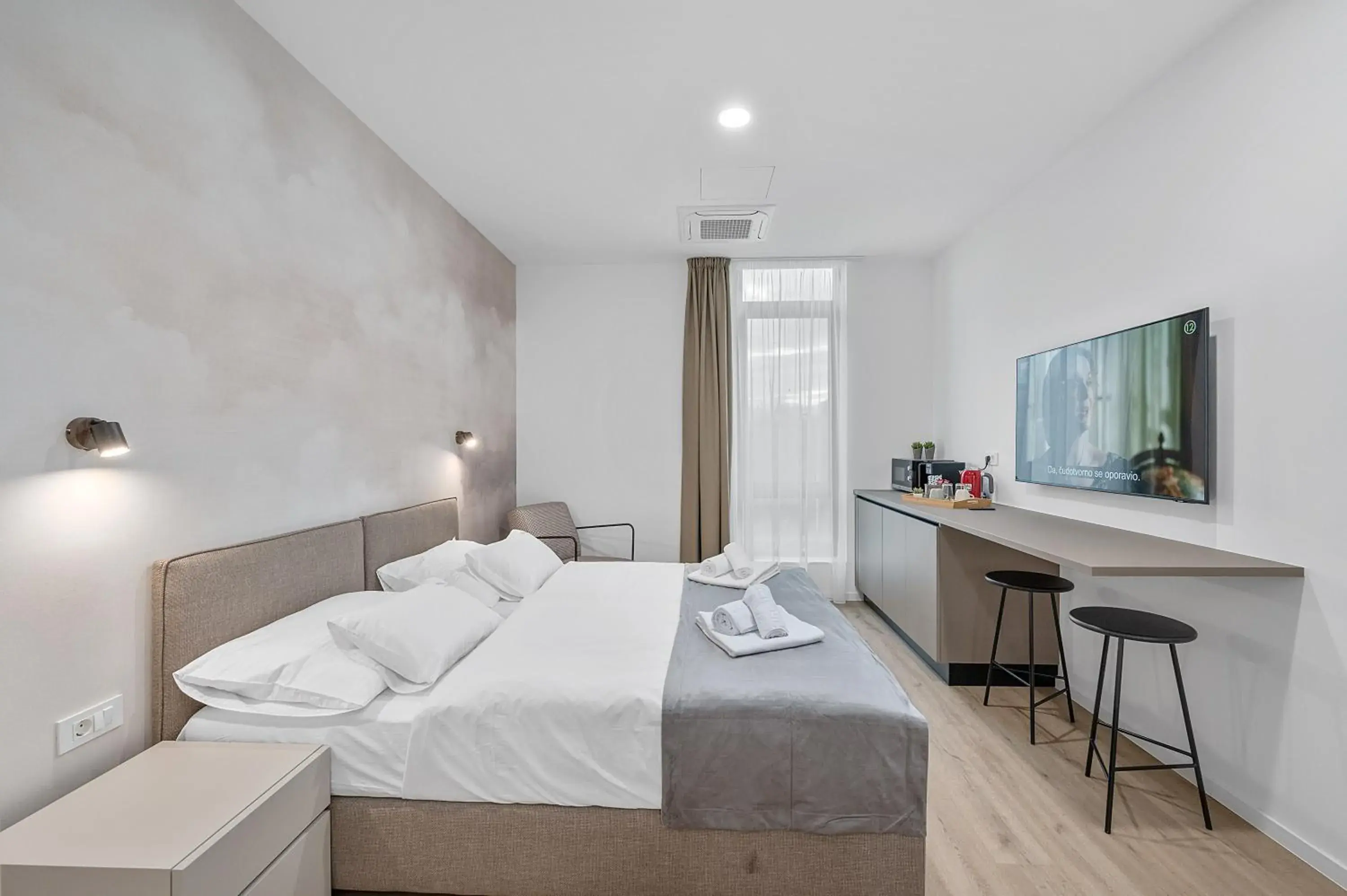 Double Room in Enjoy Apartments and Suites Double Room in Enjoy Apartments and Suites
