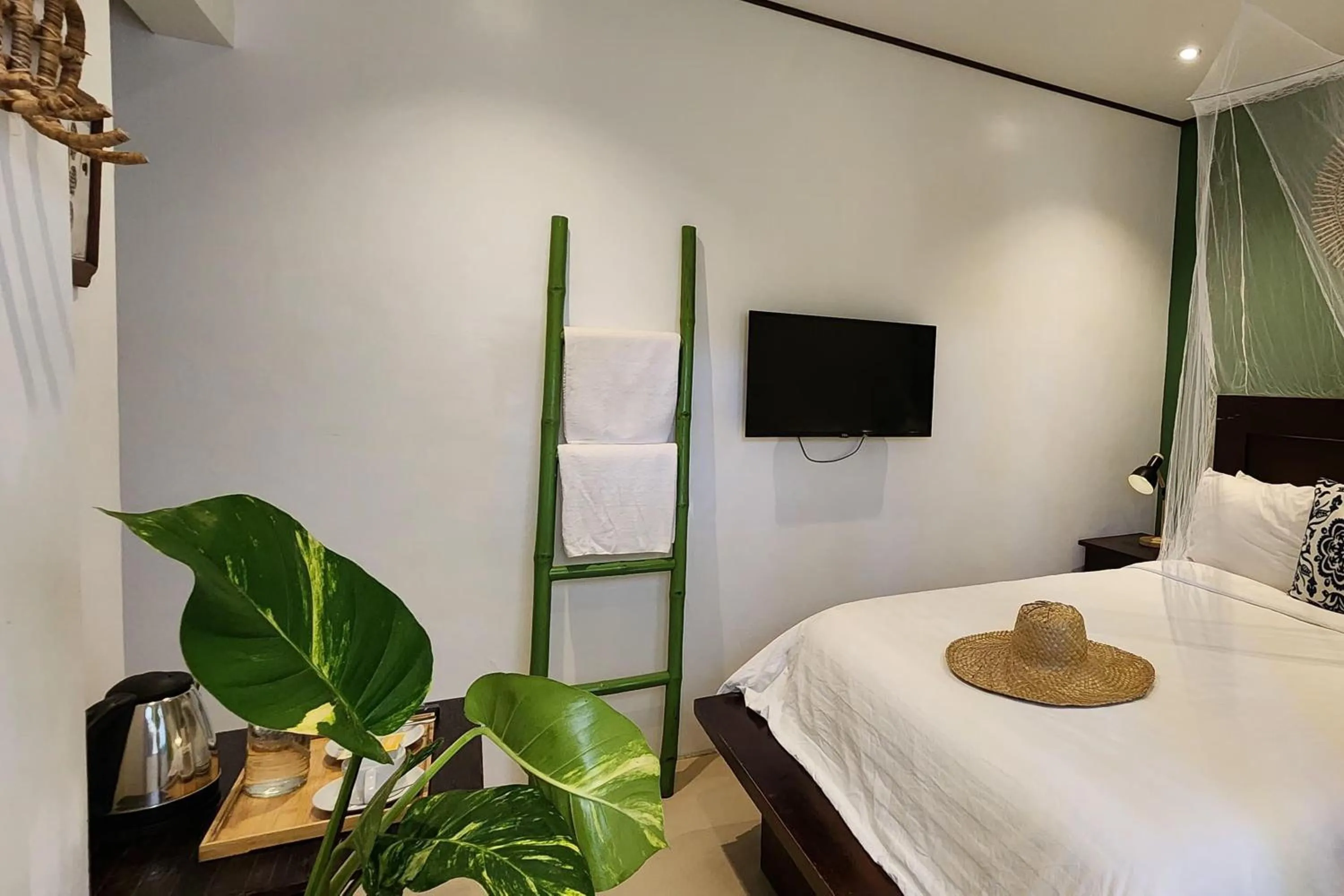 Bed in Sirom Beach House