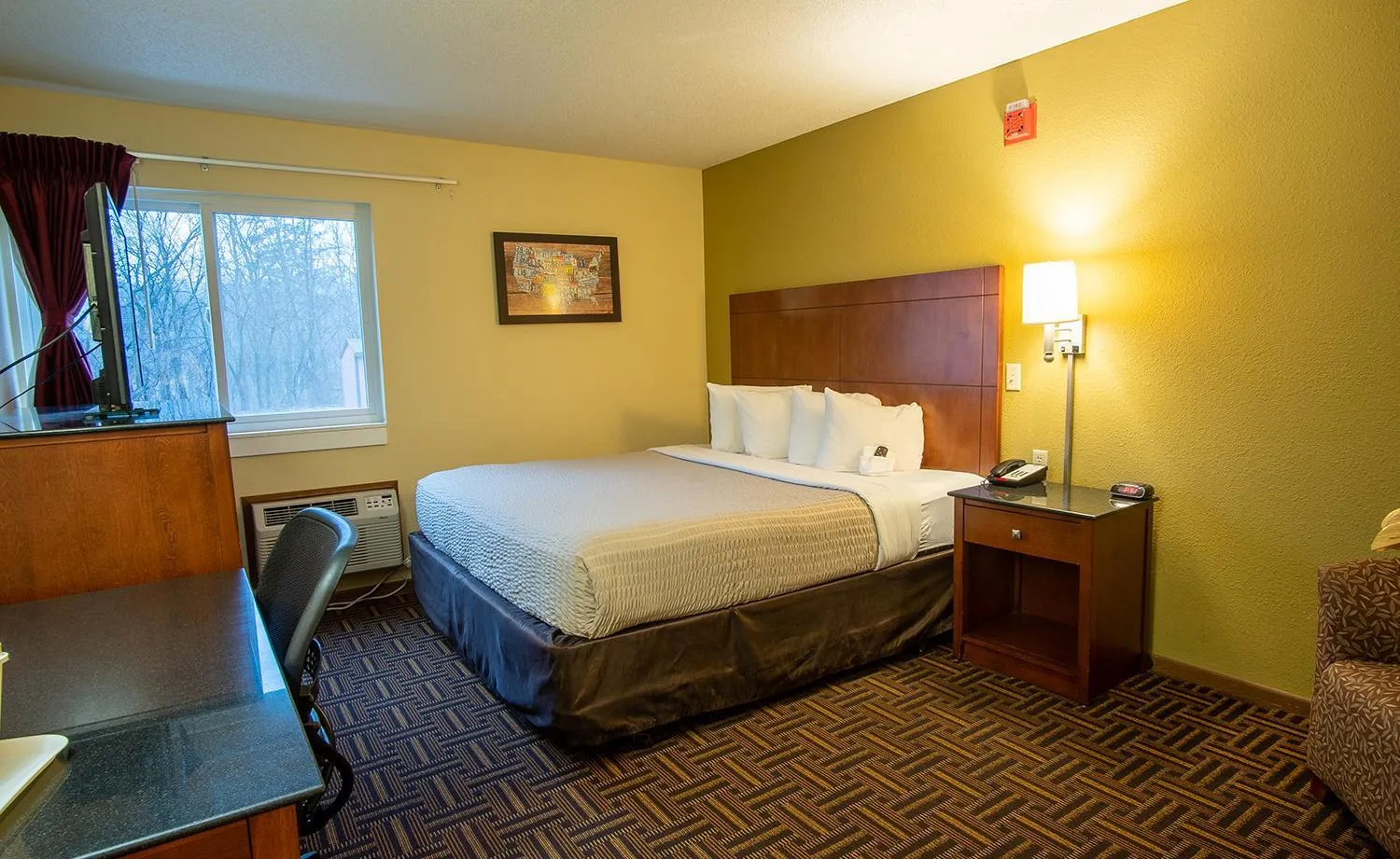 Bedroom, Bed in Coratel Inn and Suites By Jasper River Falls