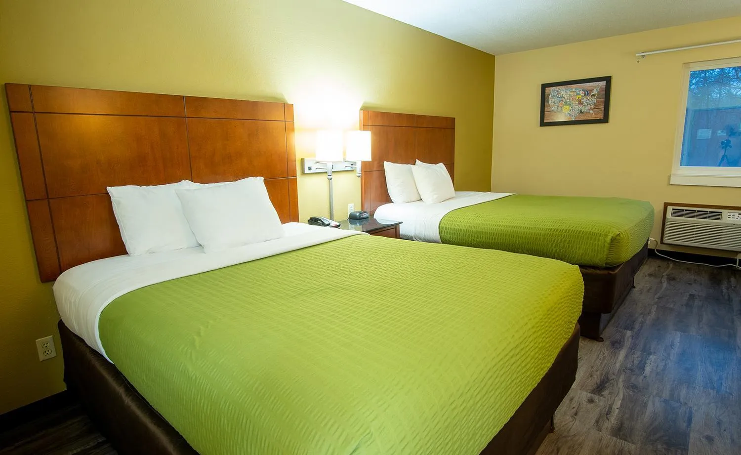 Bed in Coratel Inn and Suites By Jasper River Falls
