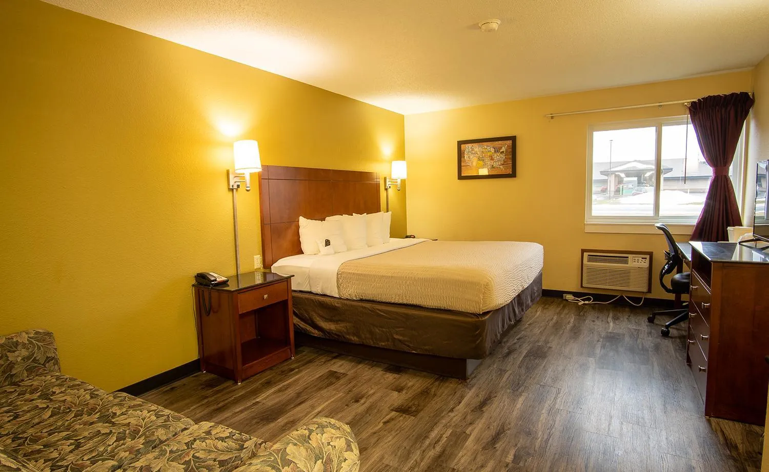 Bedroom, Bed in Coratel Inn and Suites By Jasper River Falls