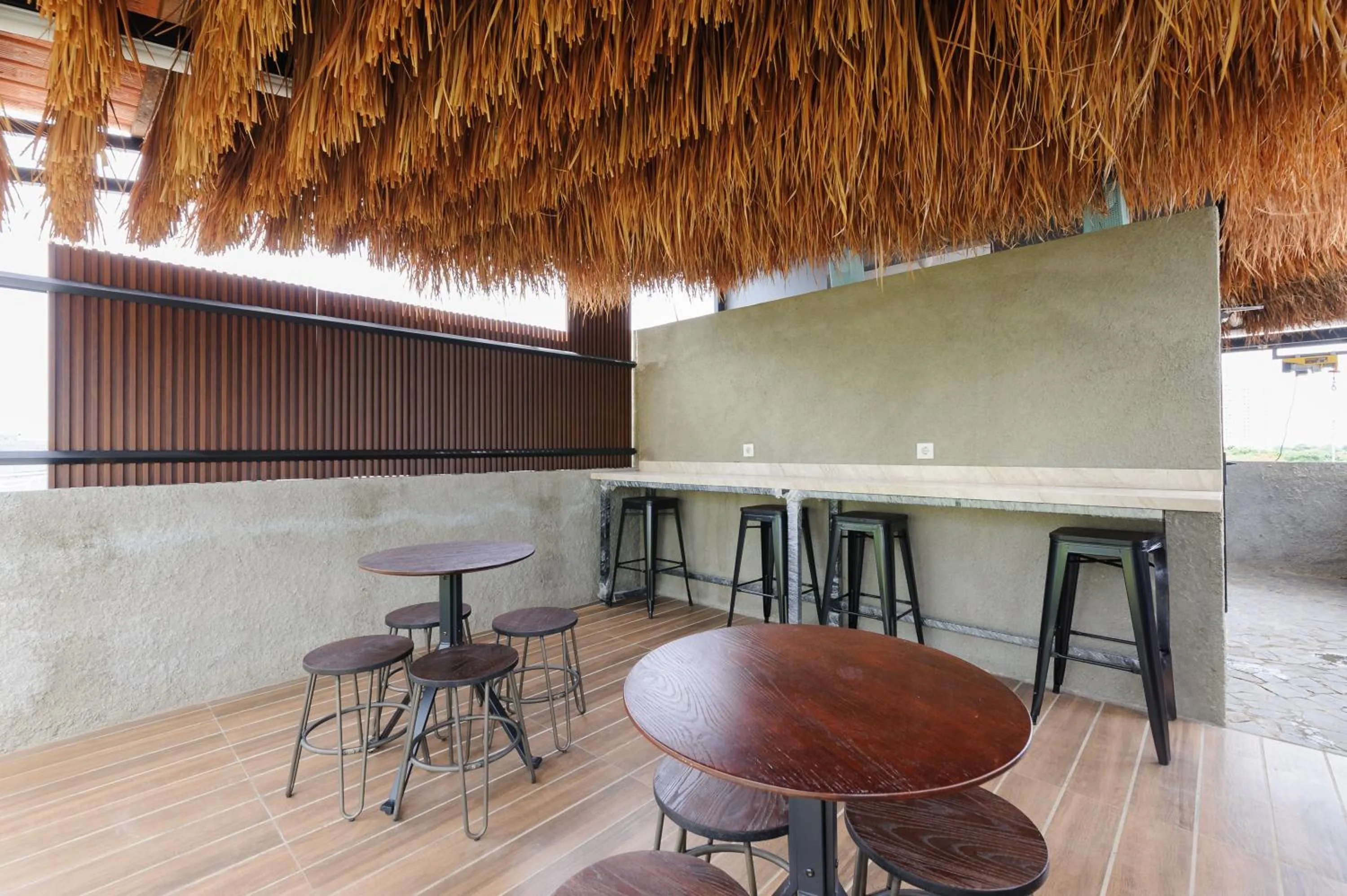 Seating area in Urbanview Syariah Kost D33 Hutan Kota Srengseng
