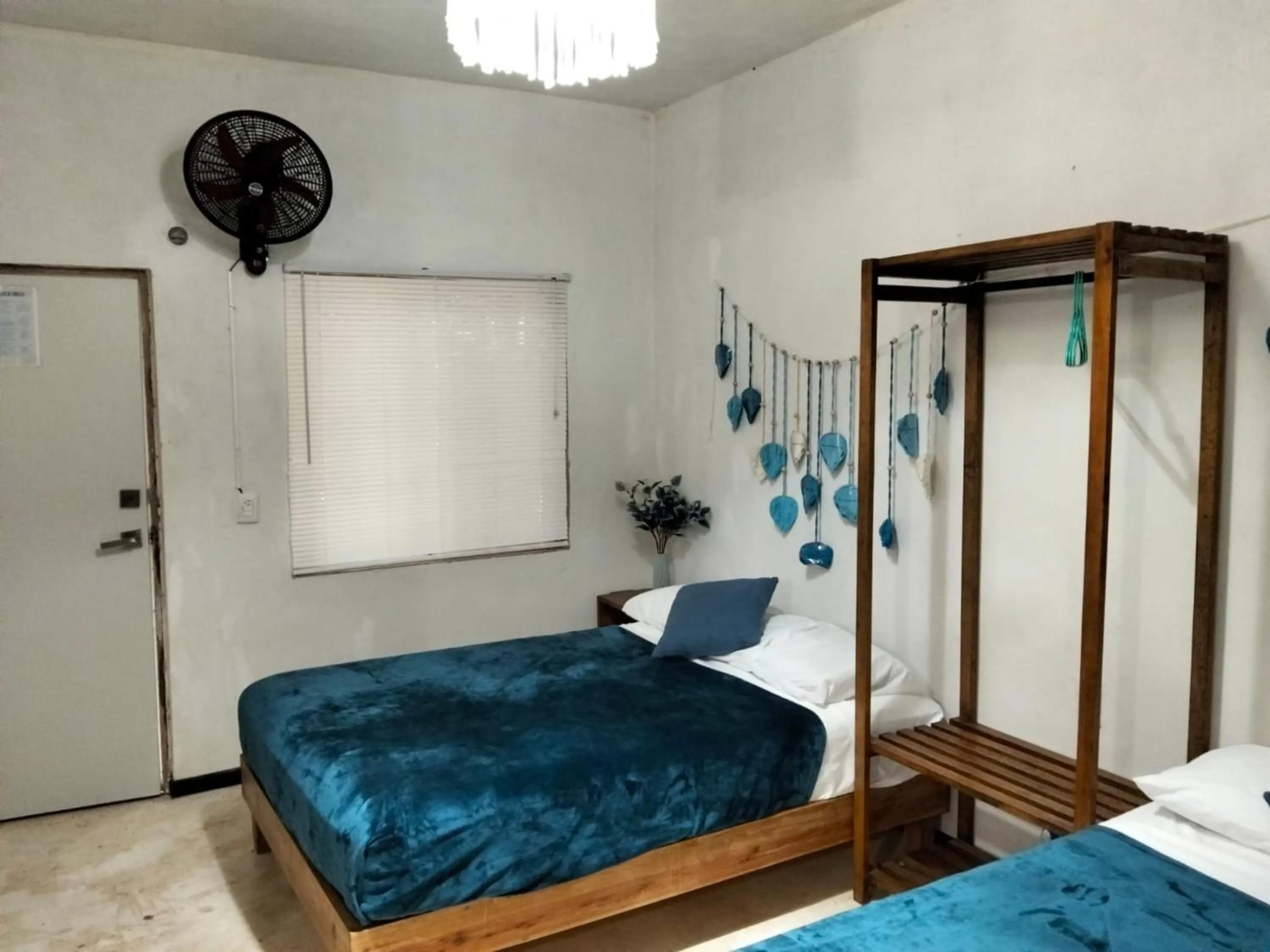 Bed in BACALAR INN Hotel