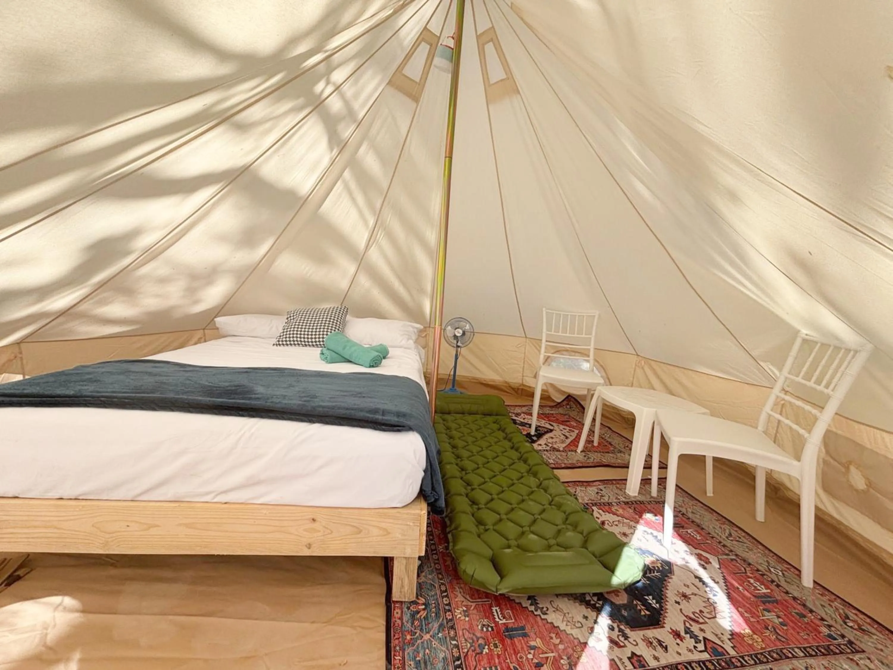 Bed in BACALAR INN Hotel