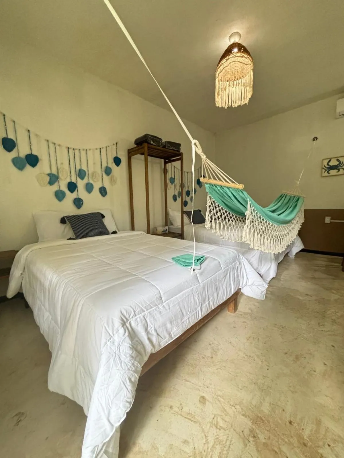 Bed in BACALAR INN Hotel