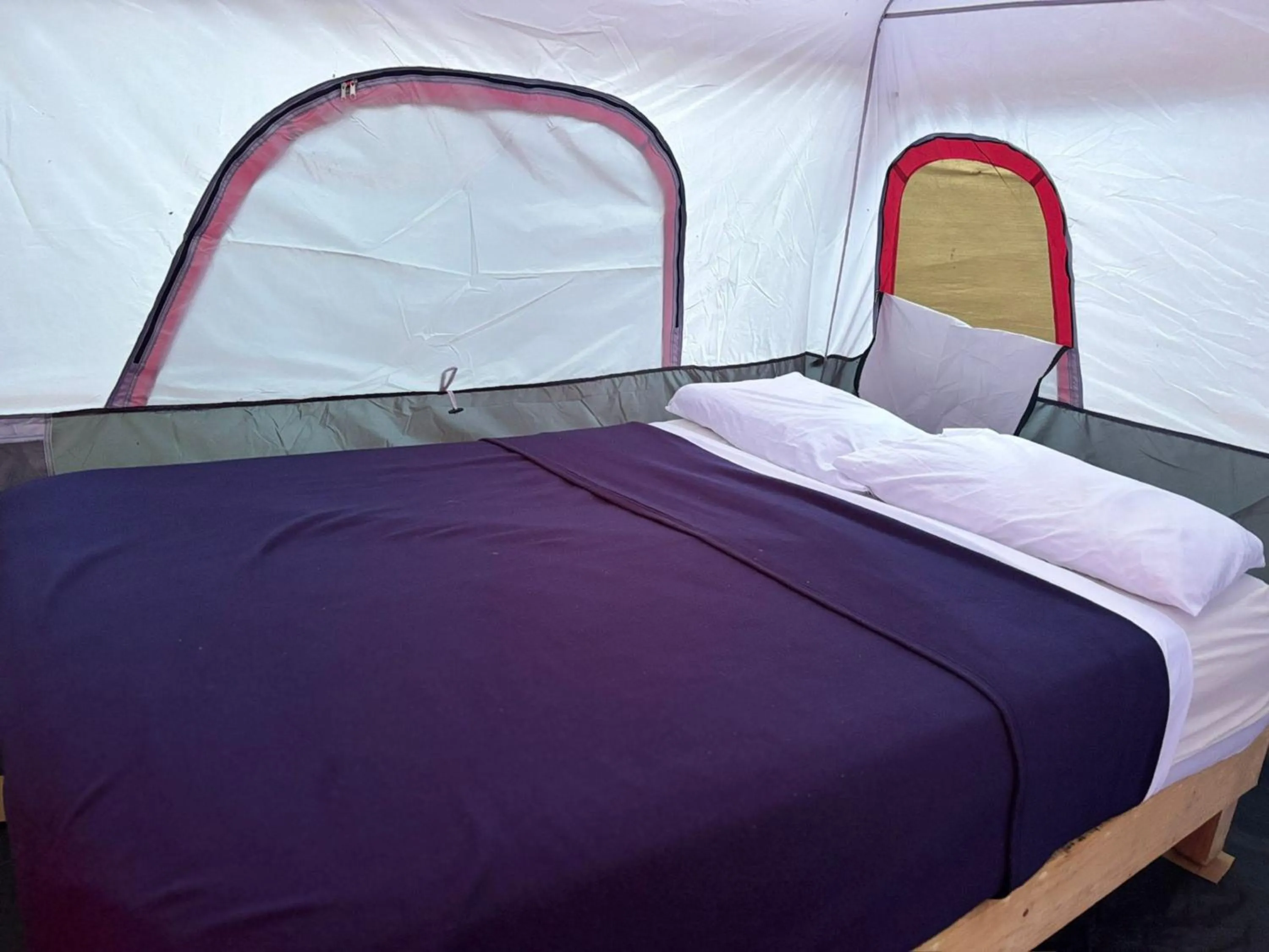 Bed in BACALAR INN Hotel