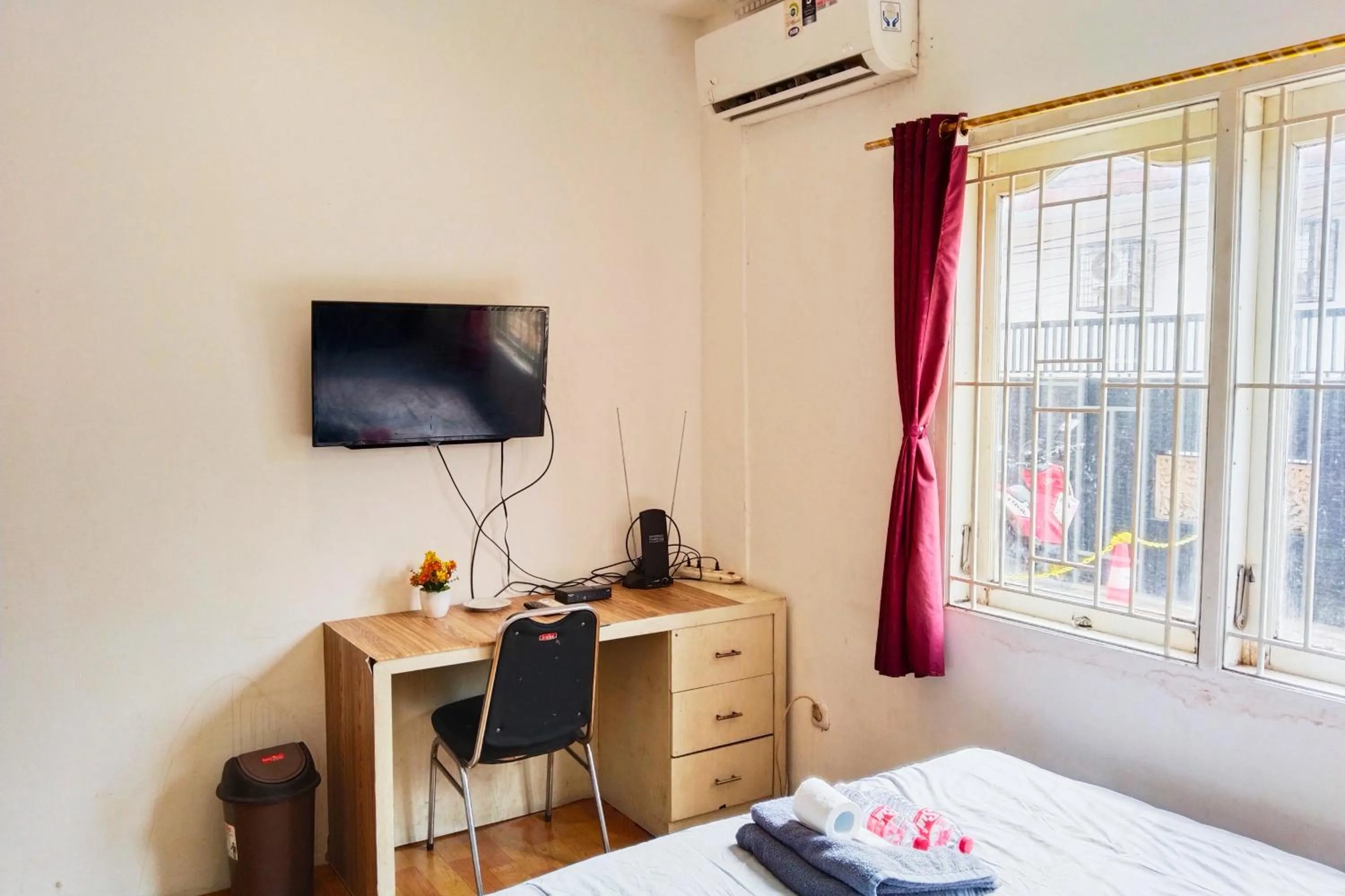 Bed in NamRoom at Kebayoran Baru