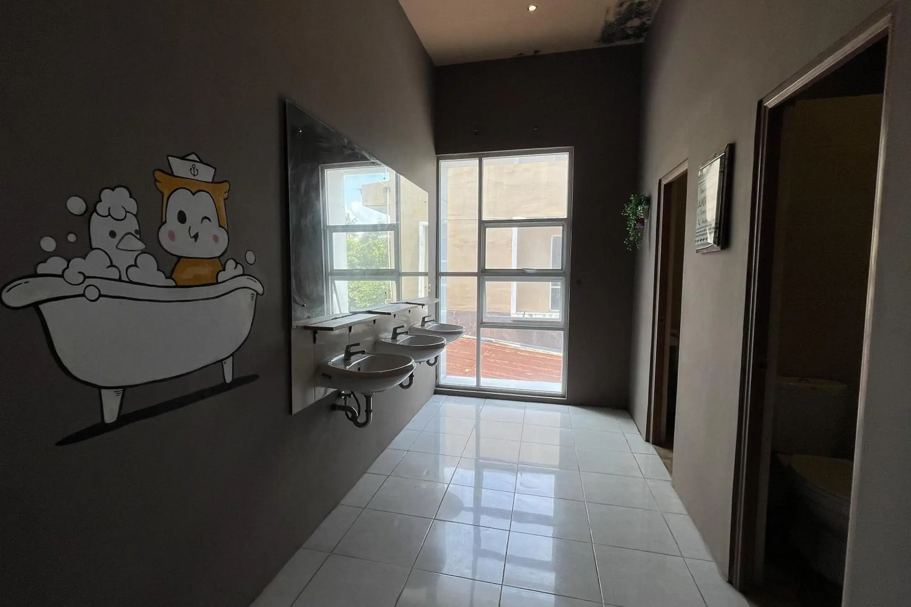 Bathroom in VK Pods Pangandaran Bathroom in VK Pods Pangandaran