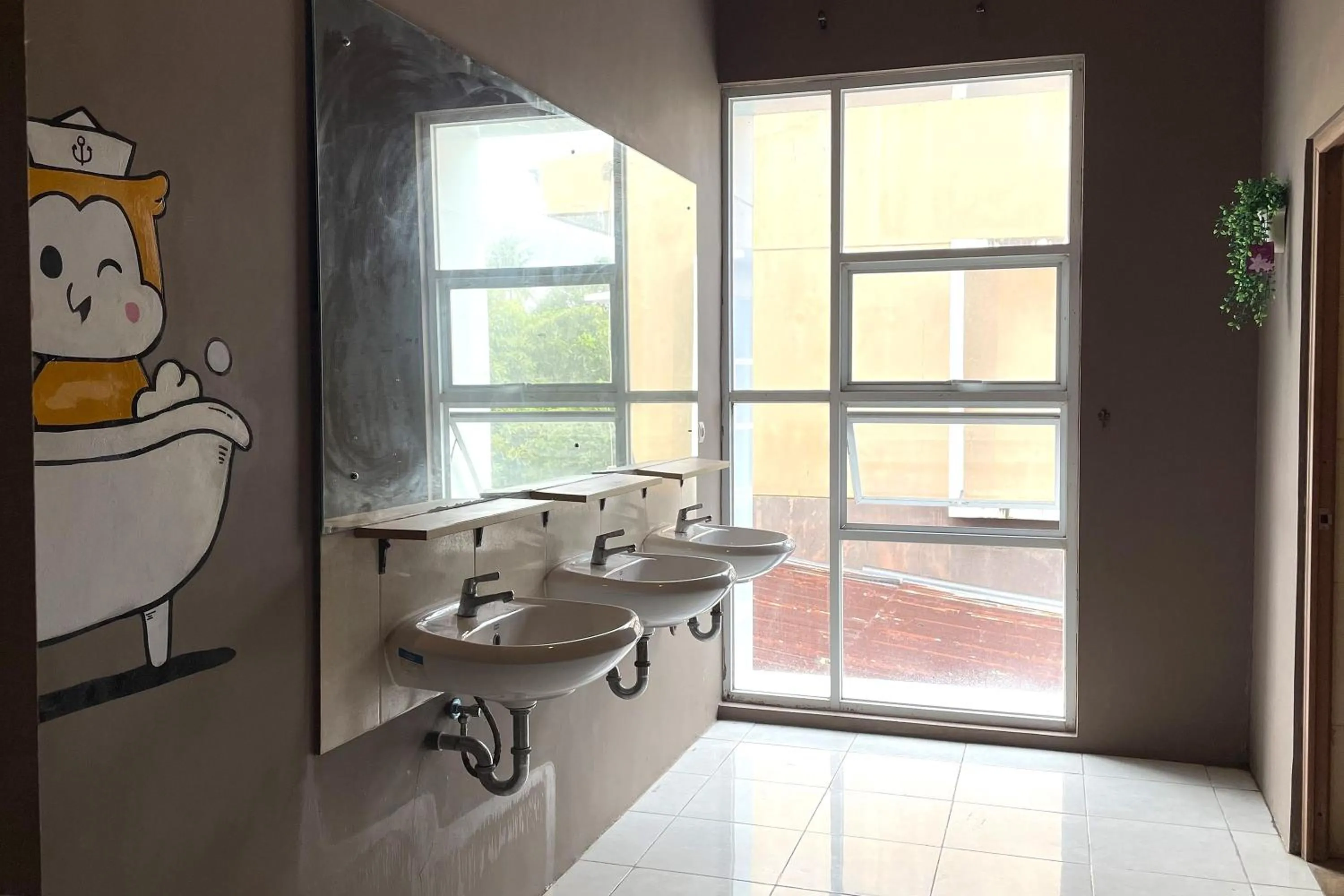 Bathroom in VK Pods Pangandaran