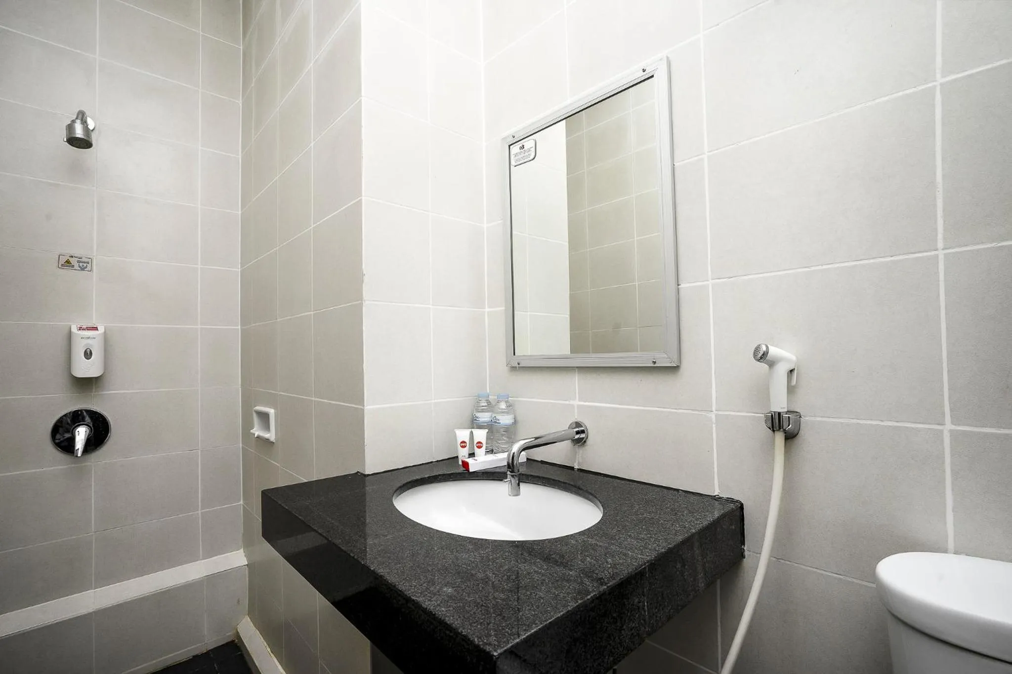 Bathroom in Hotel Grand Kartika