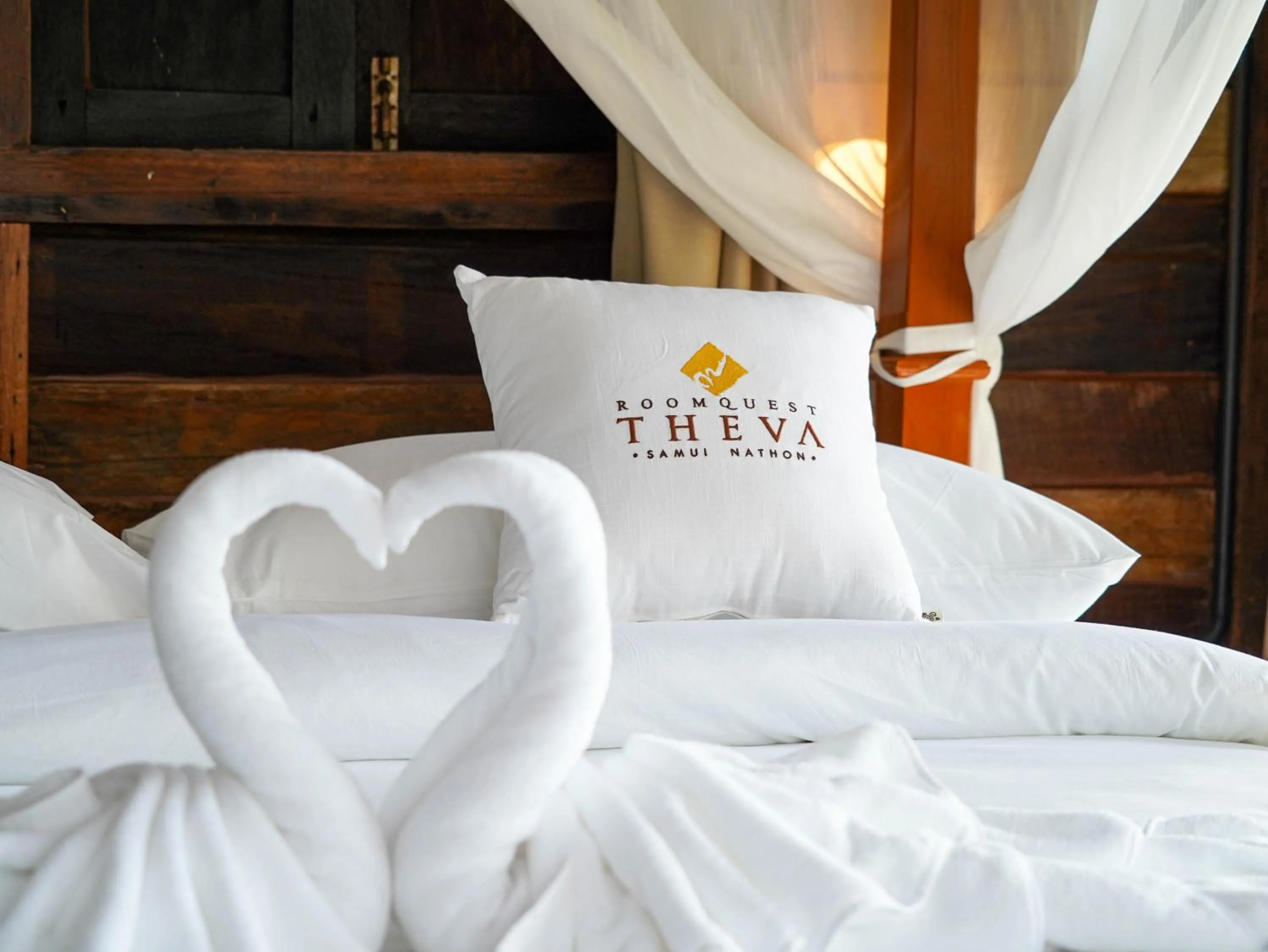 Bed in RoomQuest THEVA Resort Koh Samui