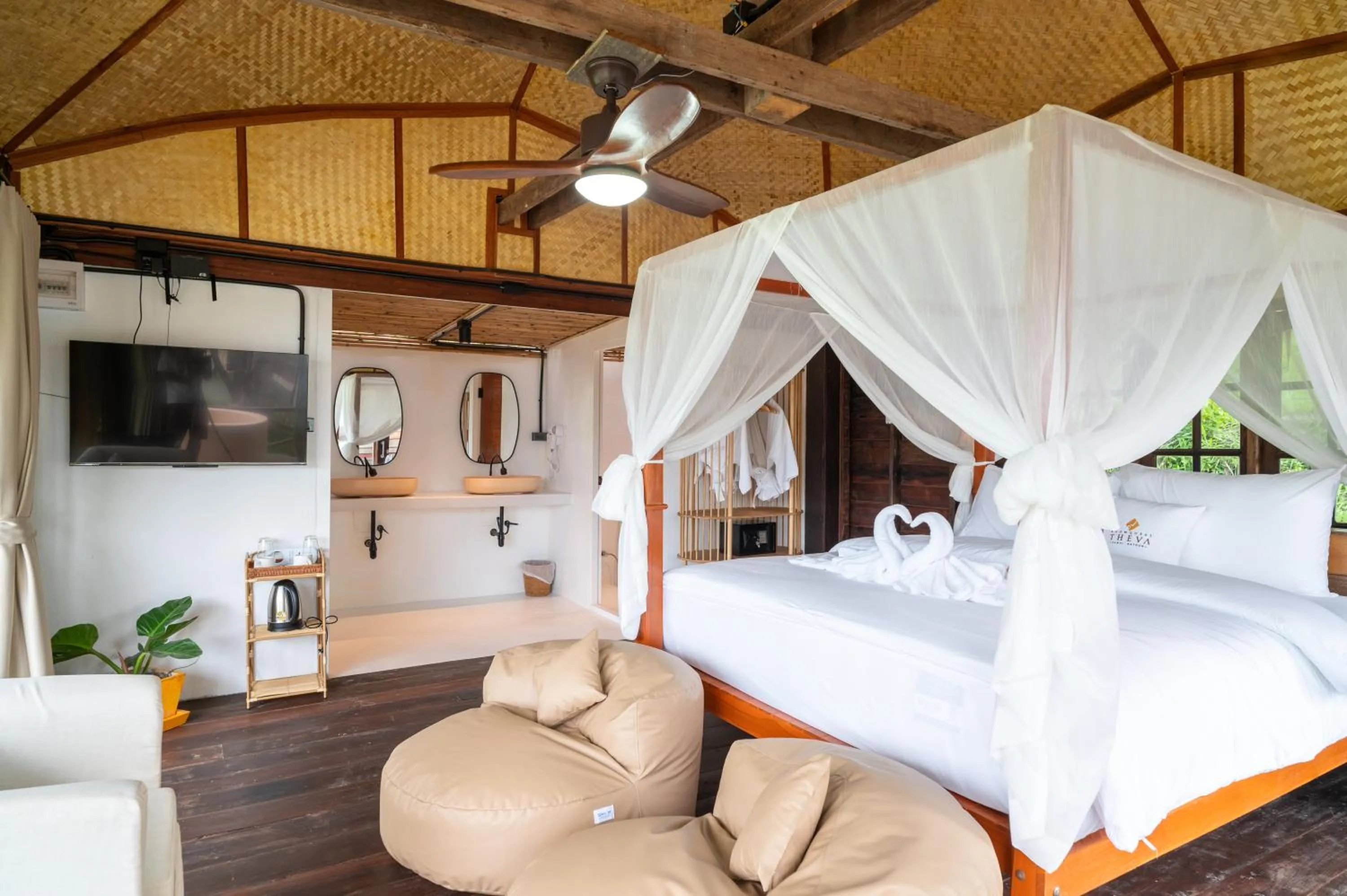 Photo of the whole room, Bed in RoomQuest THEVA Resort Koh Samui