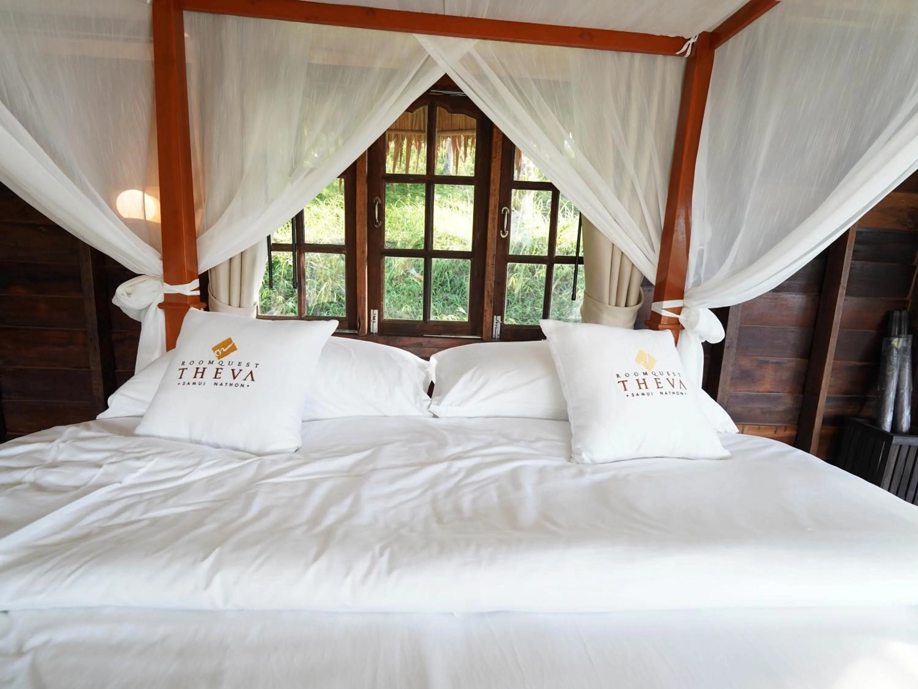 Bed in RoomQuest THEVA Resort Koh Samui