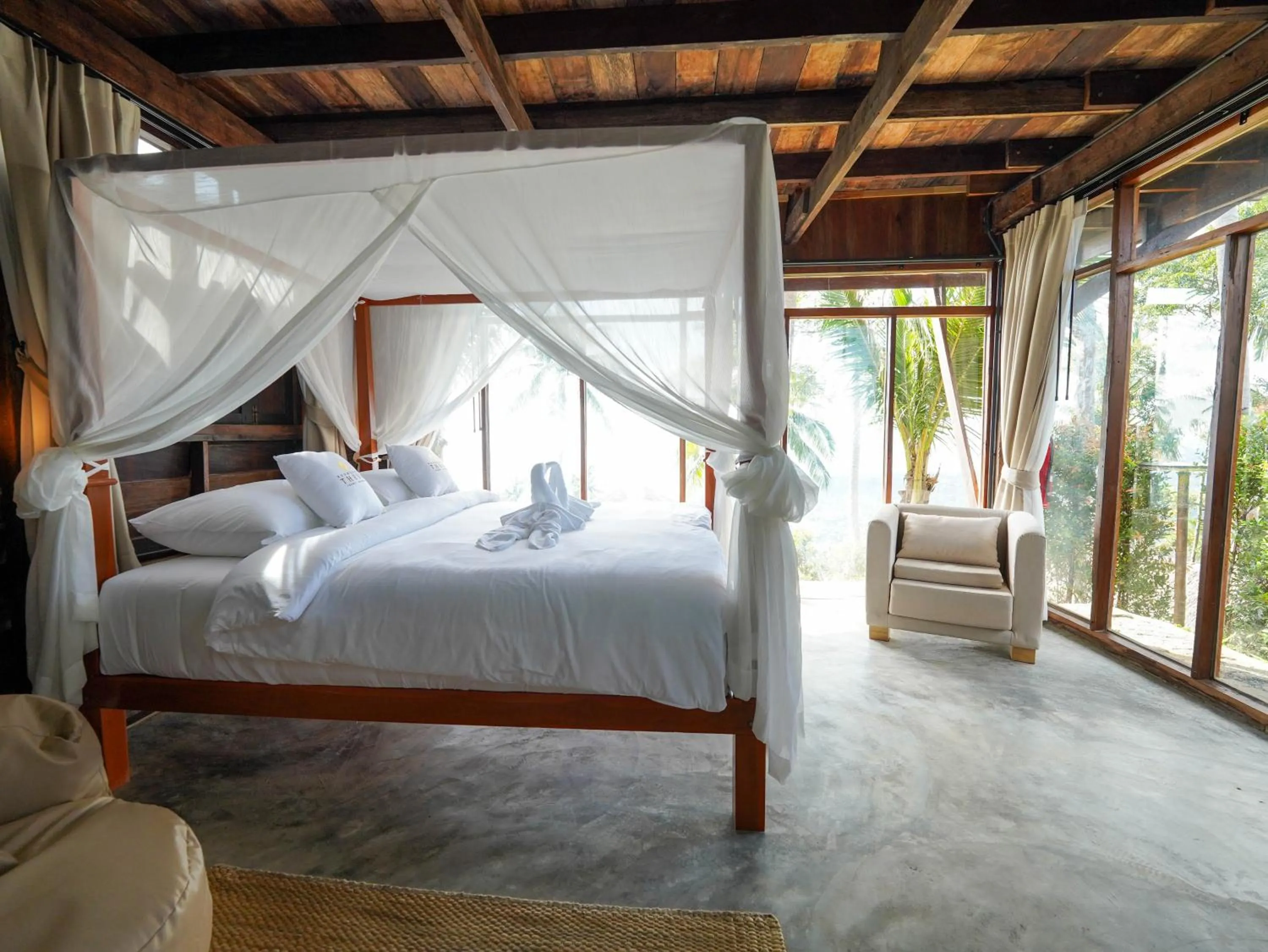 Bed in RoomQuest THEVA Resort Koh Samui