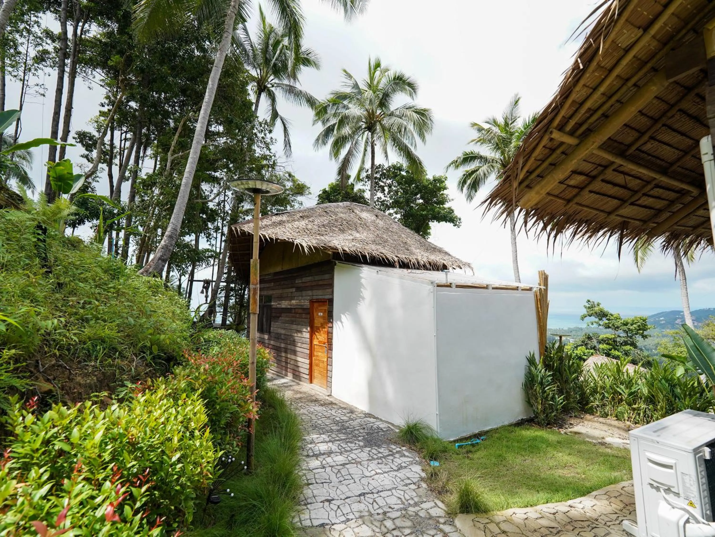 Property building in RoomQuest THEVA Resort Koh Samui