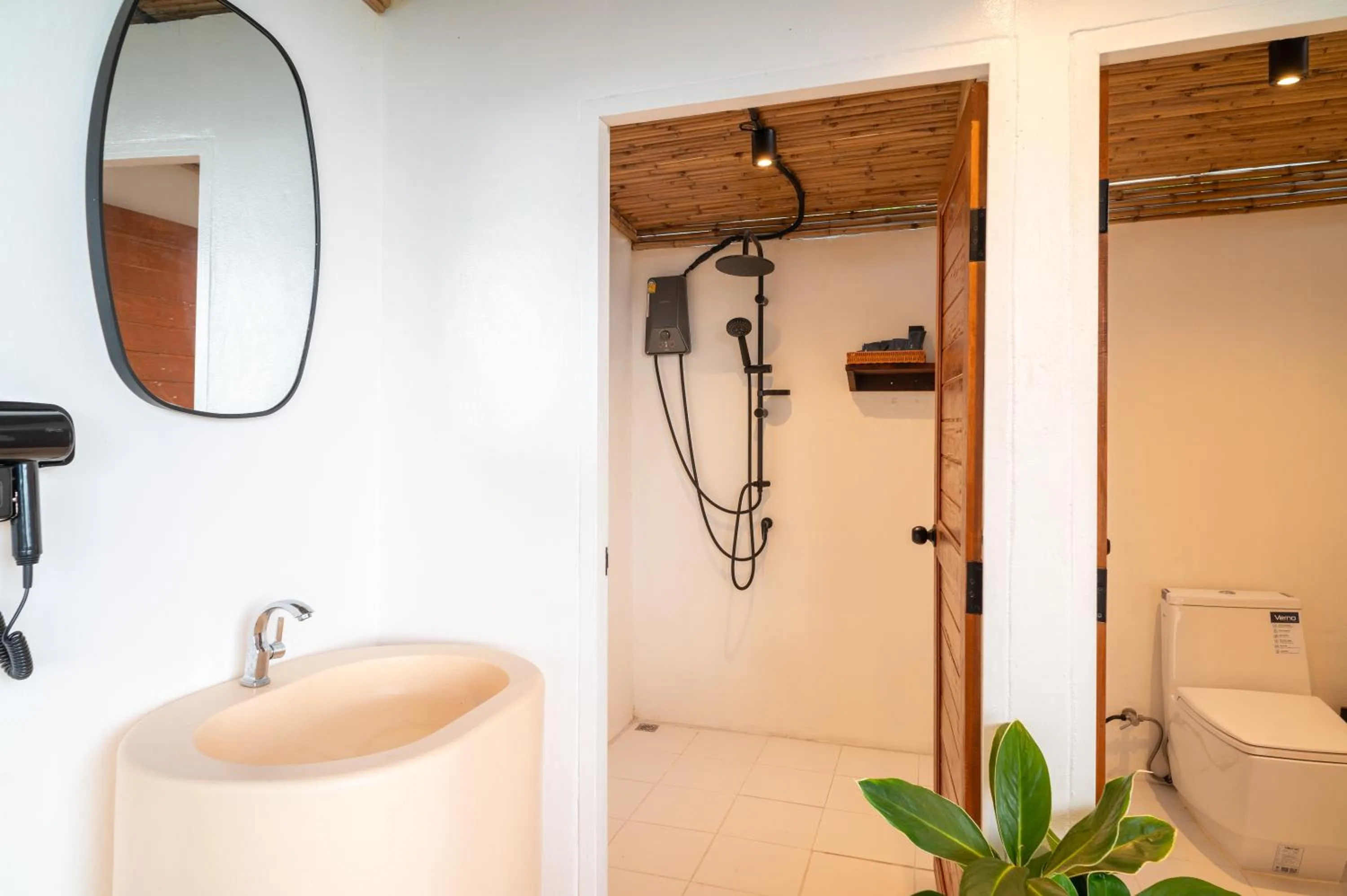 Shower in RoomQuest THEVA Resort Koh Samui