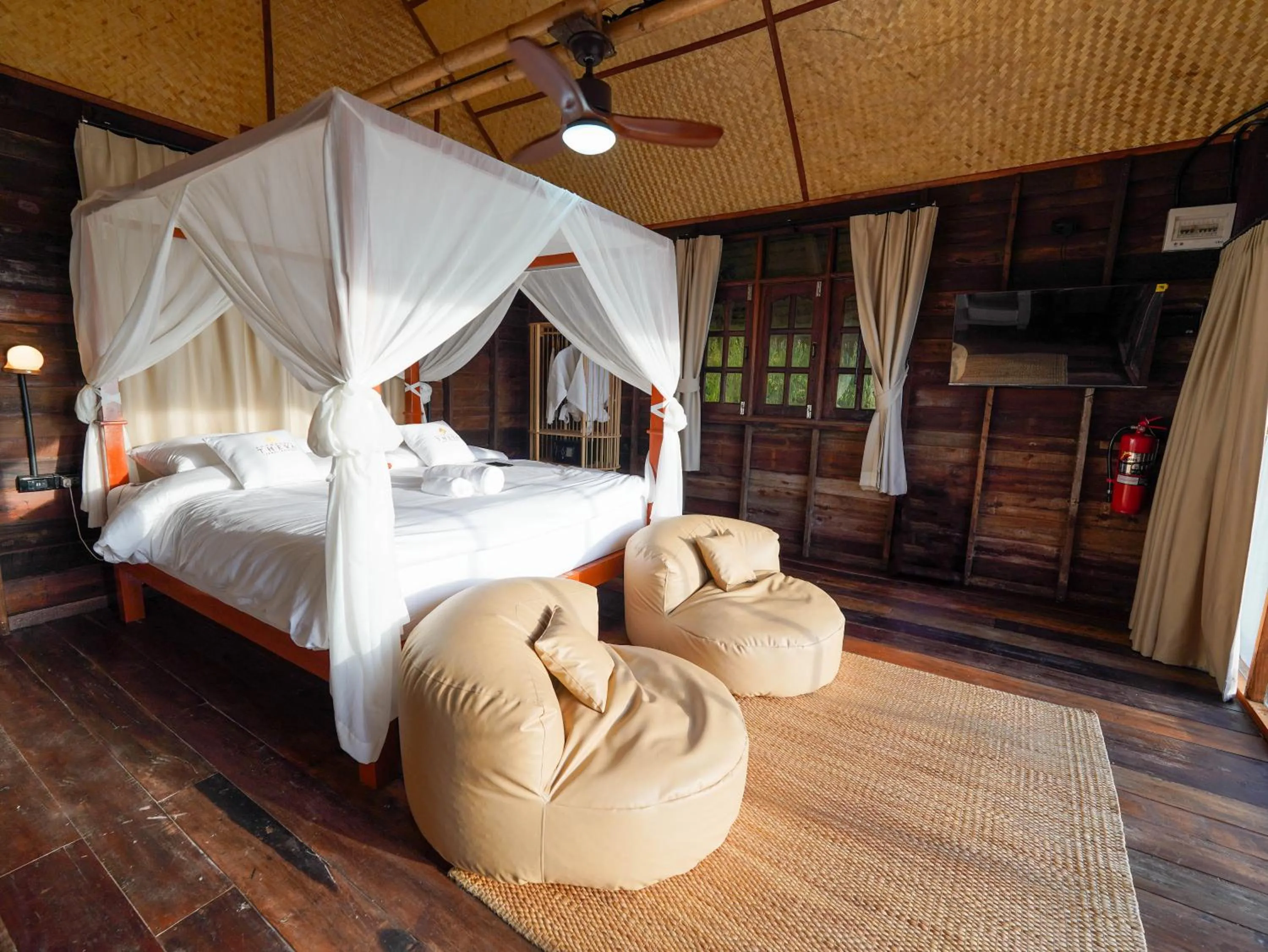 Photo of the whole room, Bed in RoomQuest THEVA Resort Koh Samui