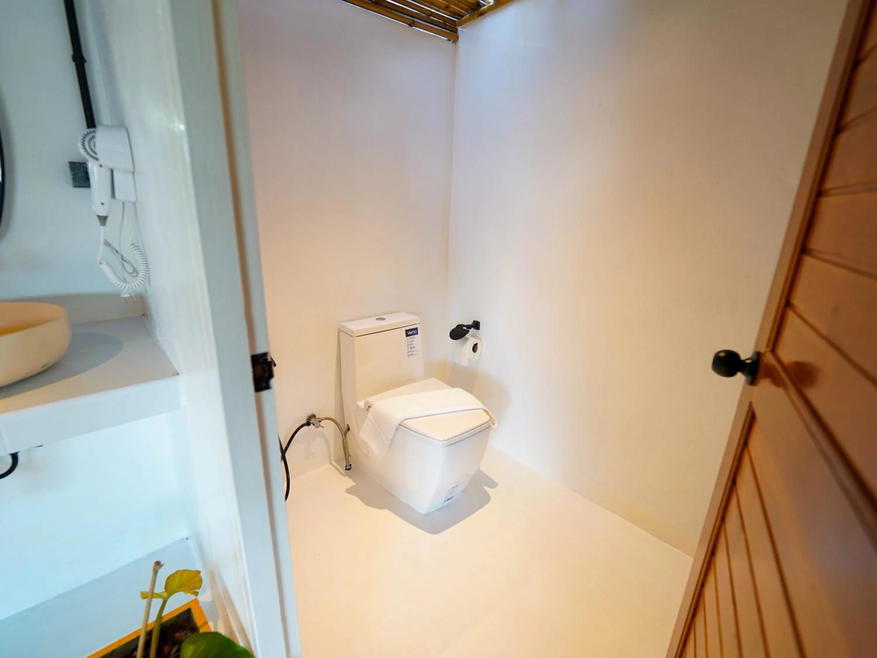 Toilet in RoomQuest THEVA Resort Koh Samui