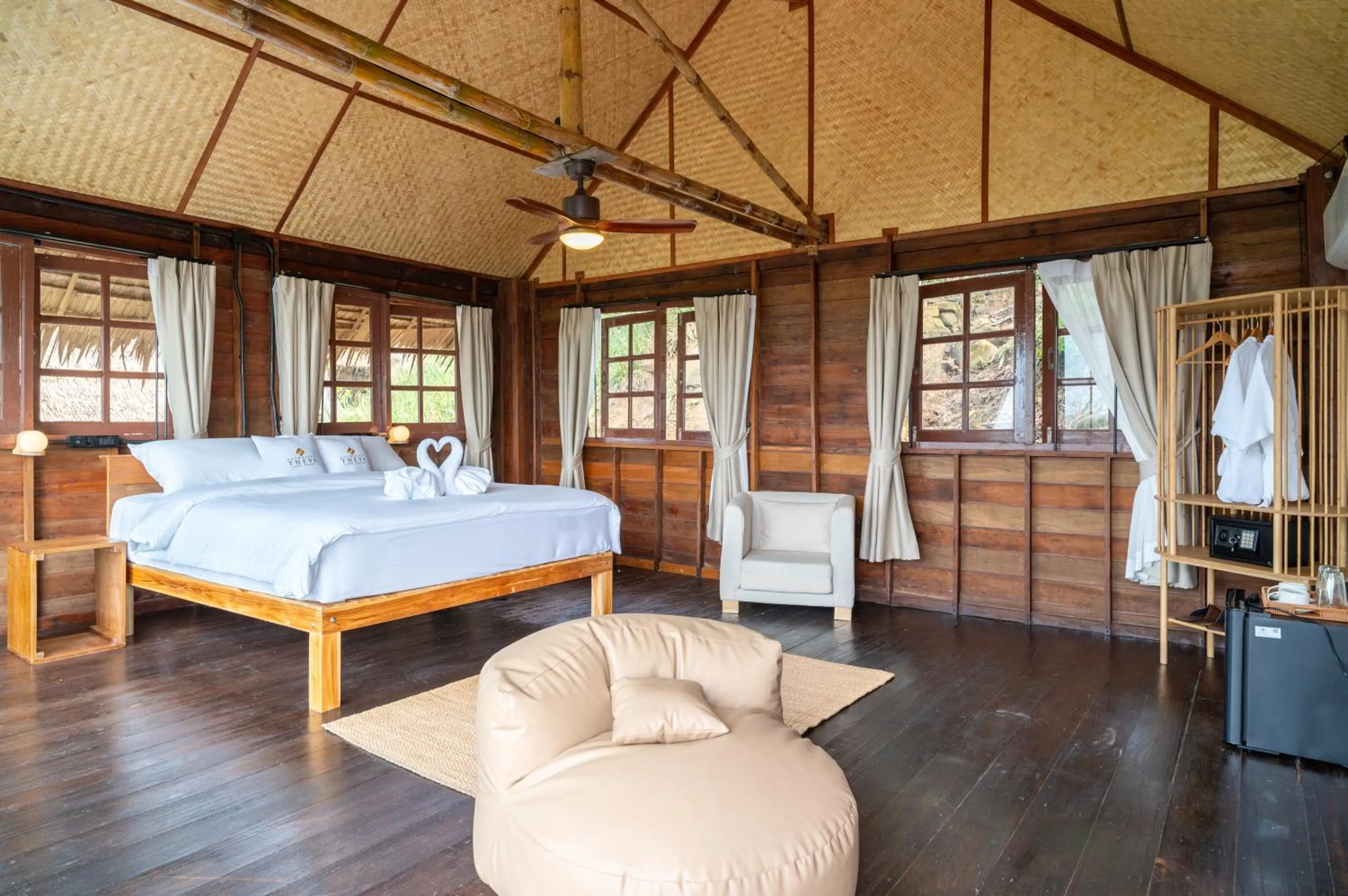 Photo of the whole room, Bed in RoomQuest THEVA Resort Koh Samui