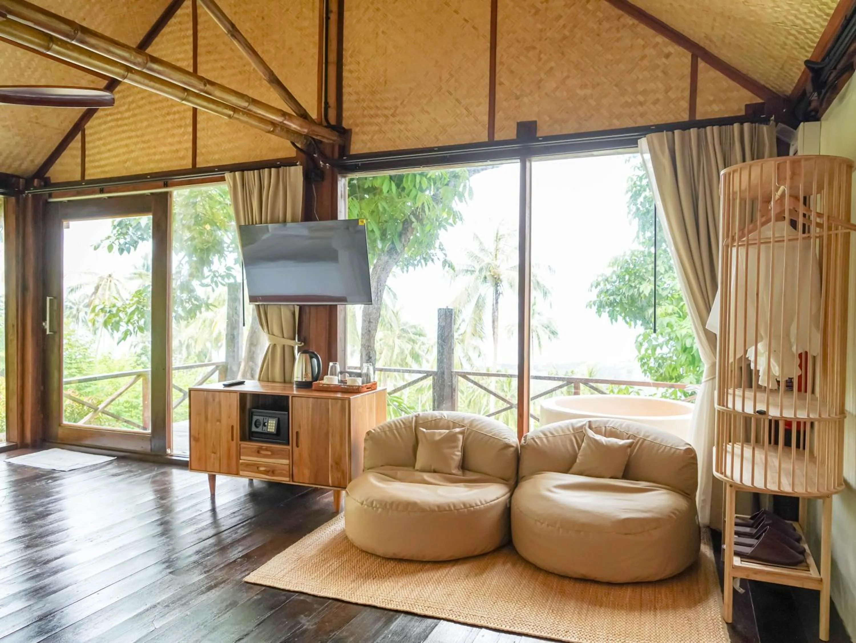 TV and multimedia in RoomQuest THEVA Resort Koh Samui