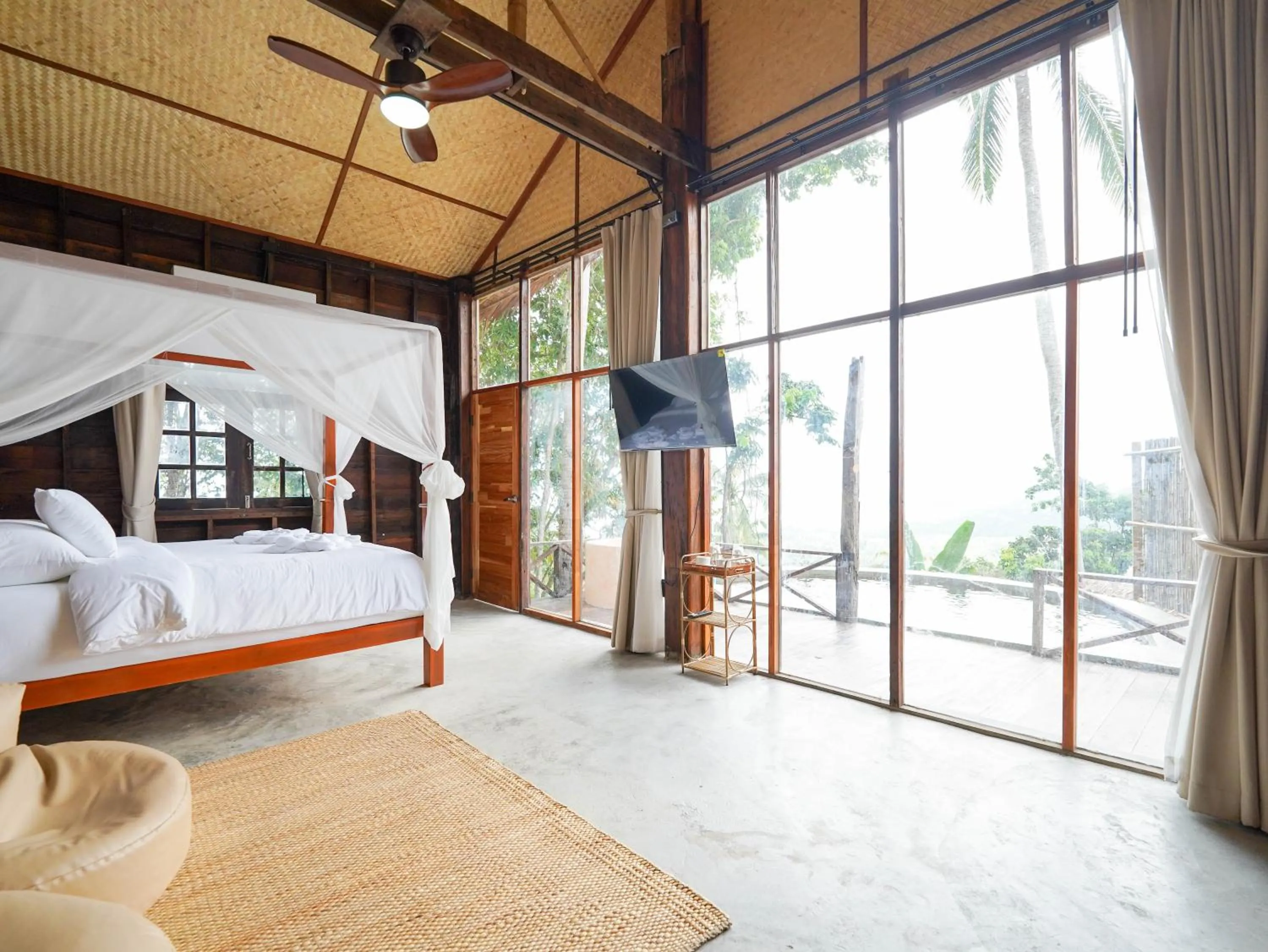 Photo of the whole room, Bed in RoomQuest THEVA Resort Koh Samui