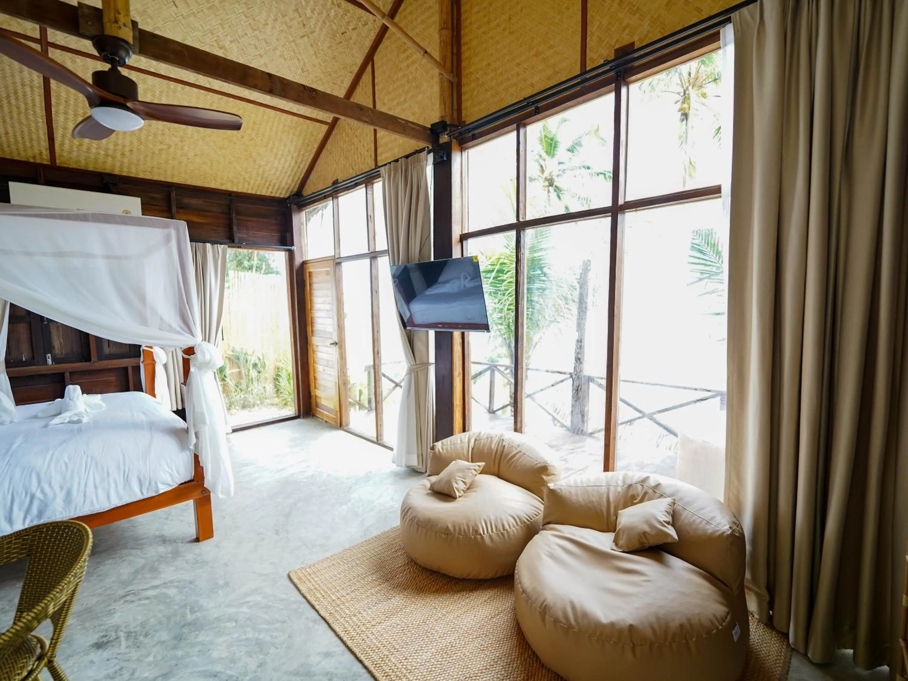 Photo of the whole room, Bed in RoomQuest THEVA Resort Koh Samui