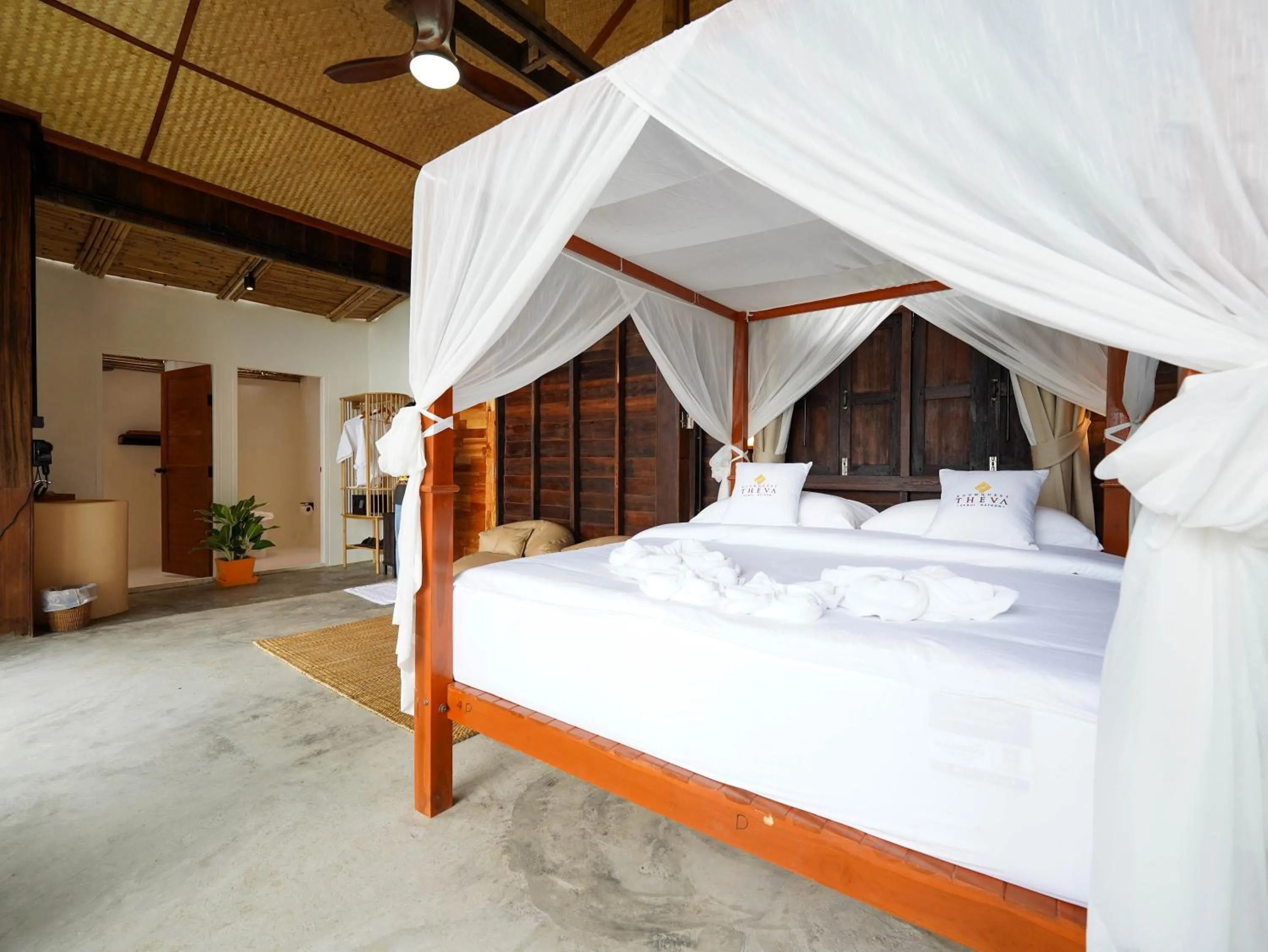 Photo of the whole room, Bed in RoomQuest THEVA Resort Koh Samui