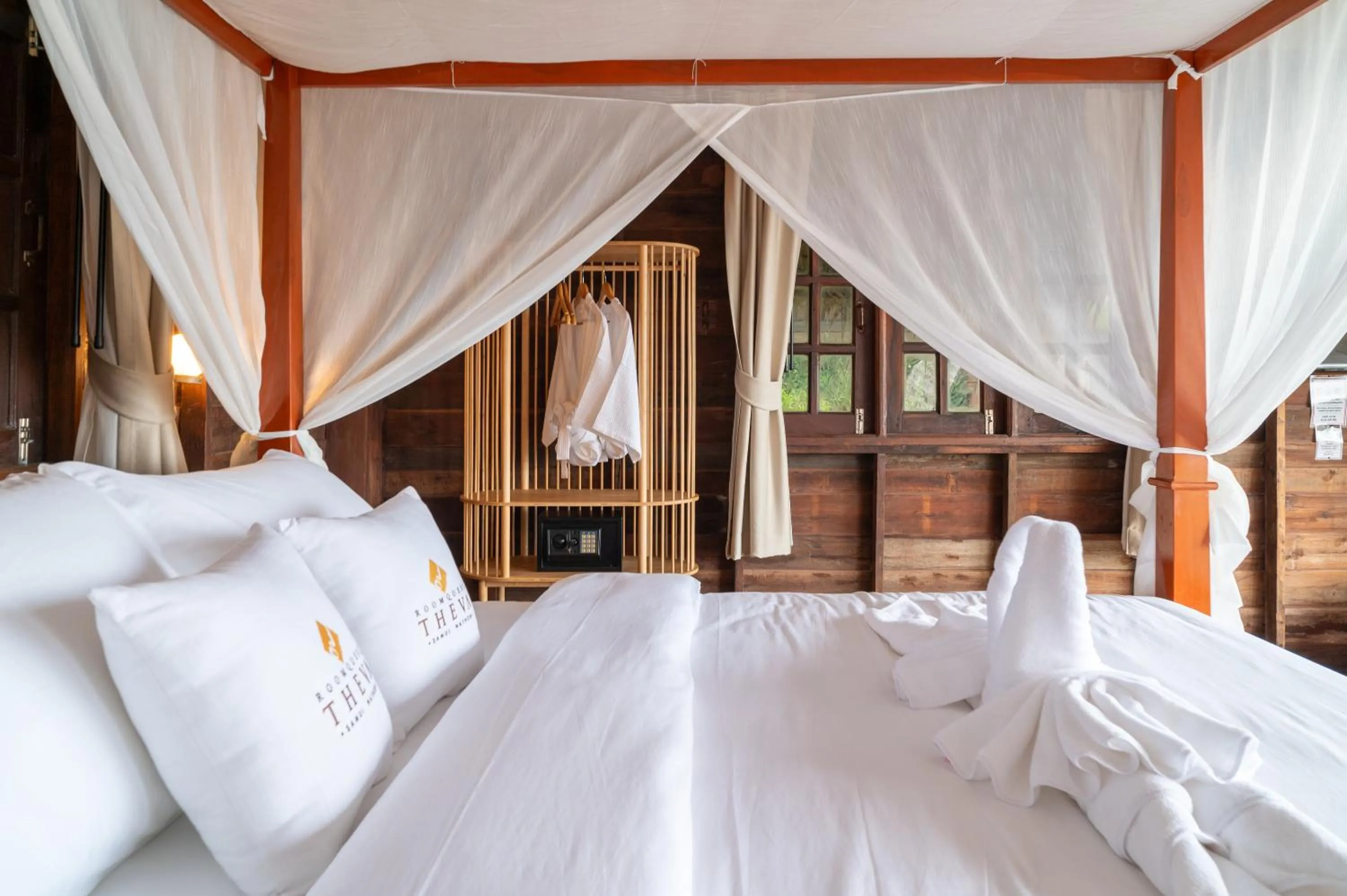 Bed in RoomQuest THEVA Resort Koh Samui