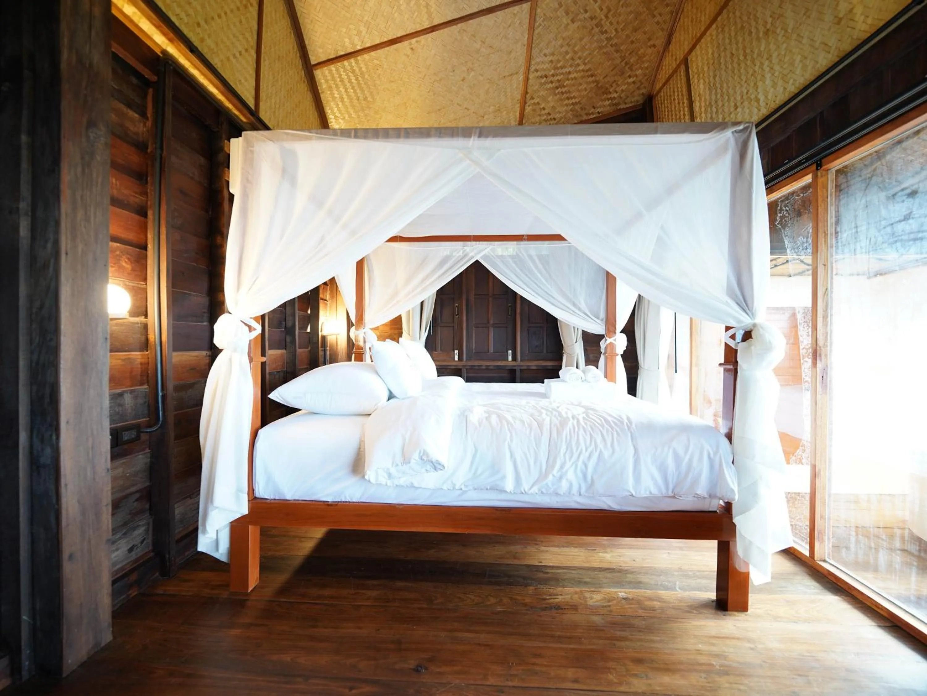 Photo of the whole room, Bed in RoomQuest THEVA Resort Koh Samui