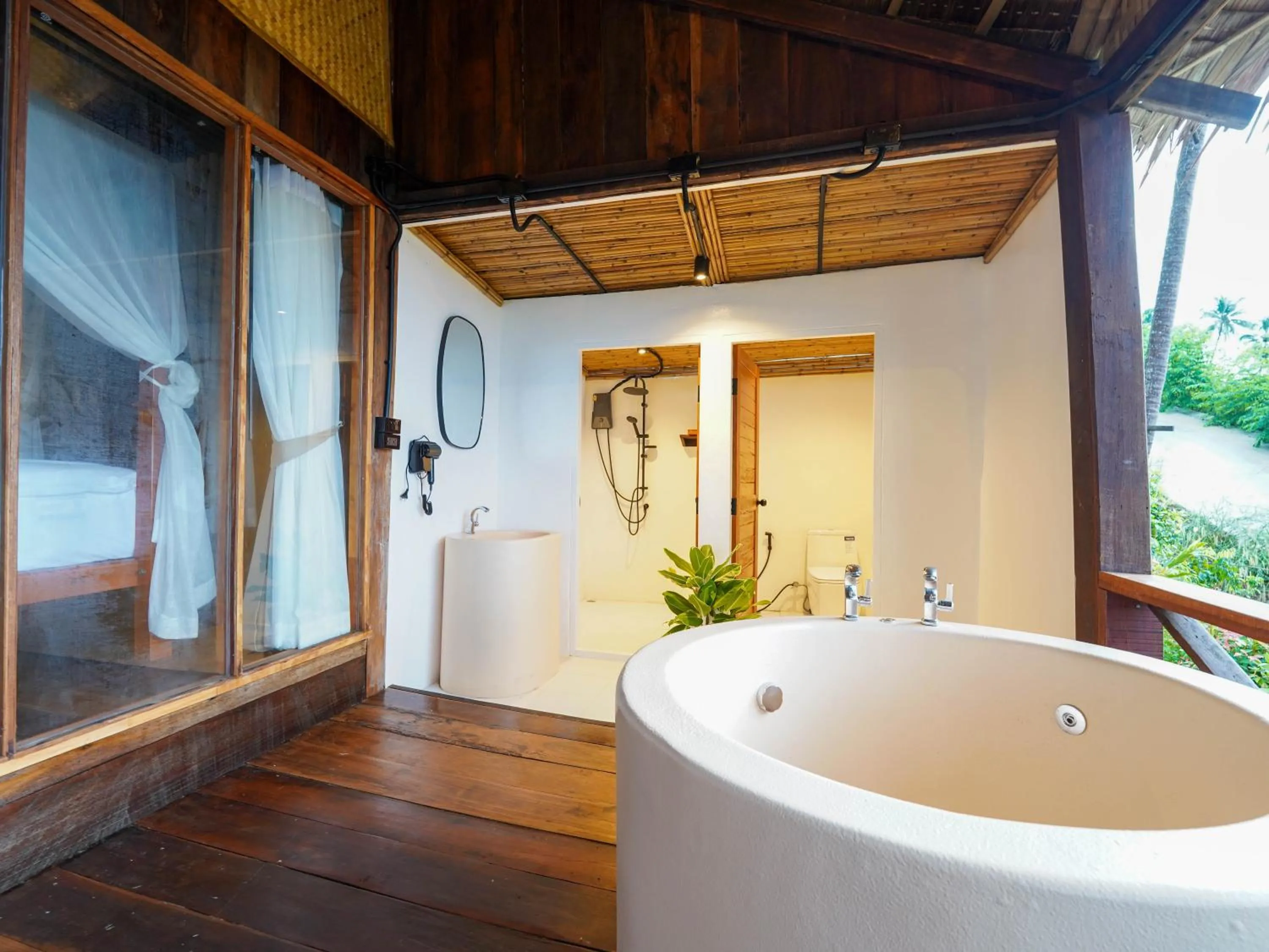 Bathroom in RoomQuest THEVA Resort Koh Samui