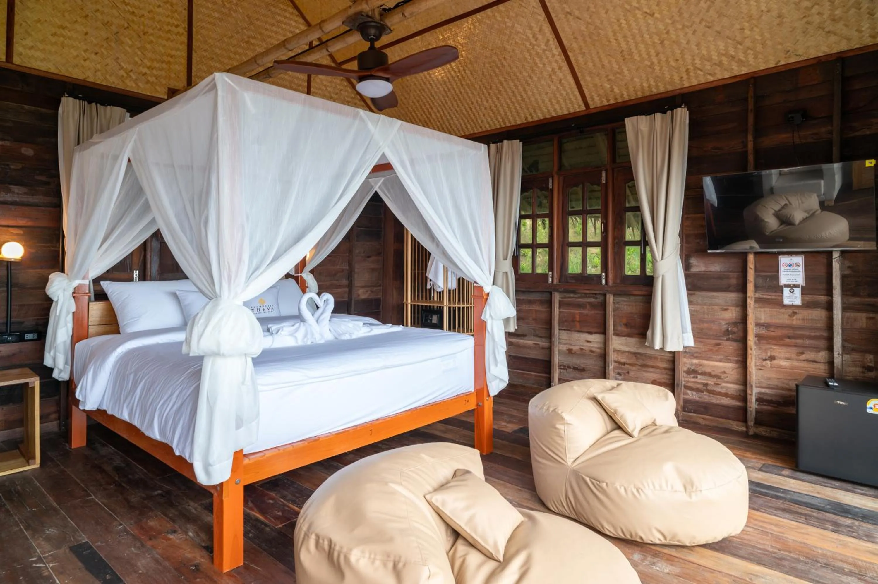 Photo of the whole room, Bed in RoomQuest THEVA Resort Koh Samui