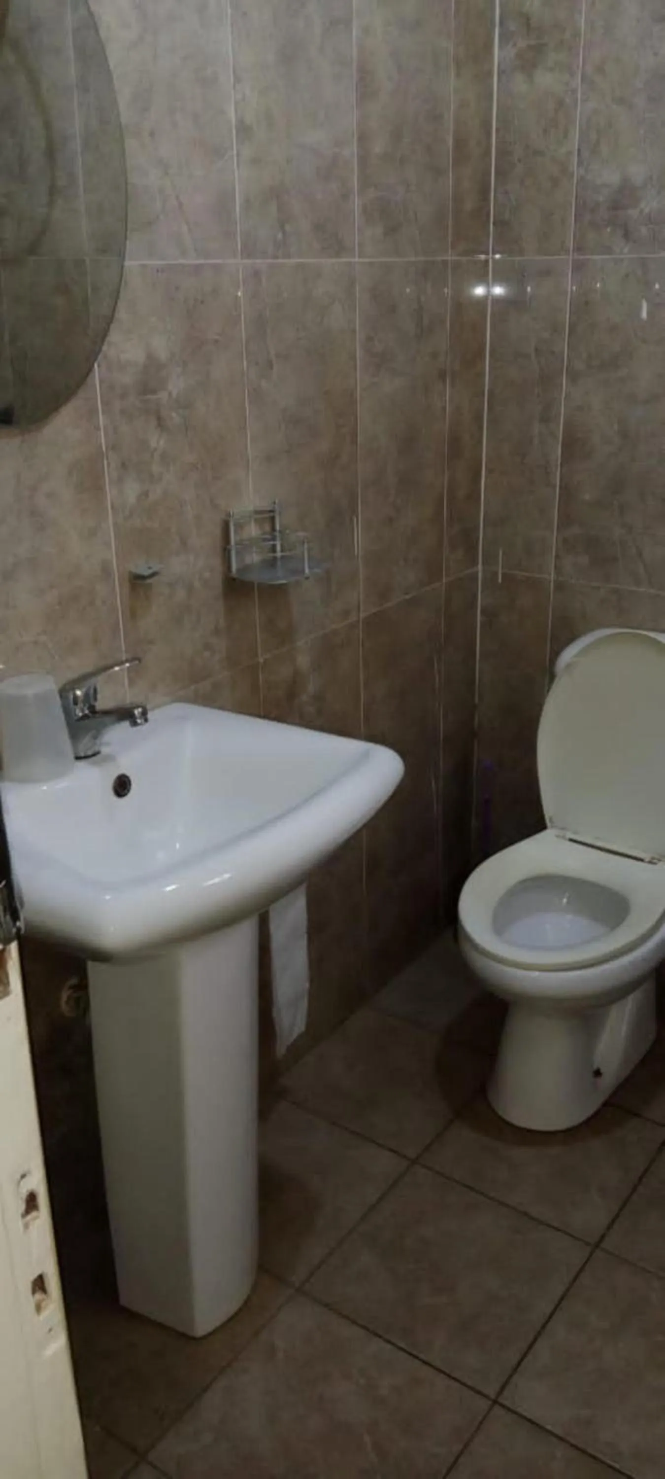 Toilet in Gorilla African Guest House