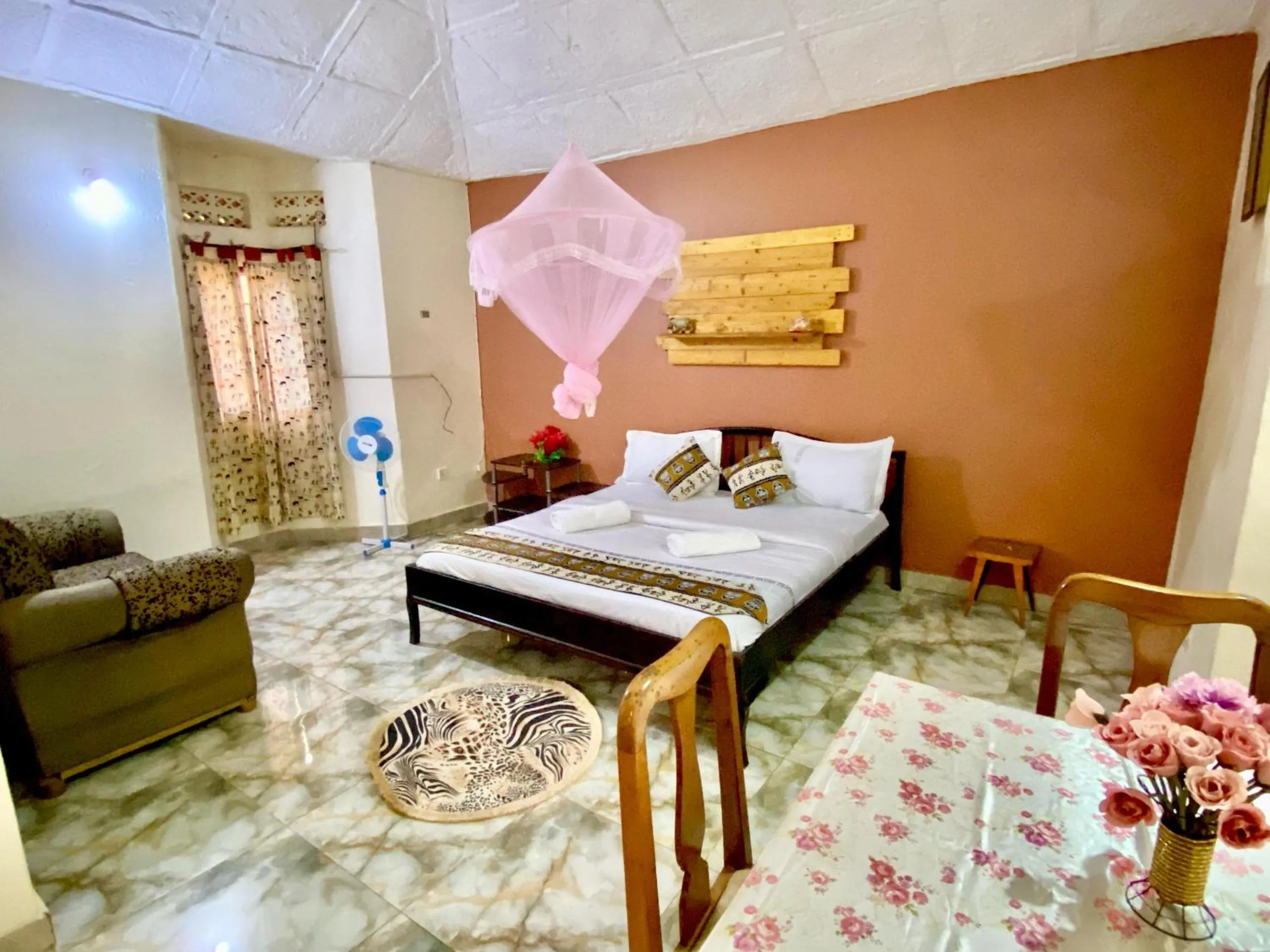 Bed in Gorilla African Guest House