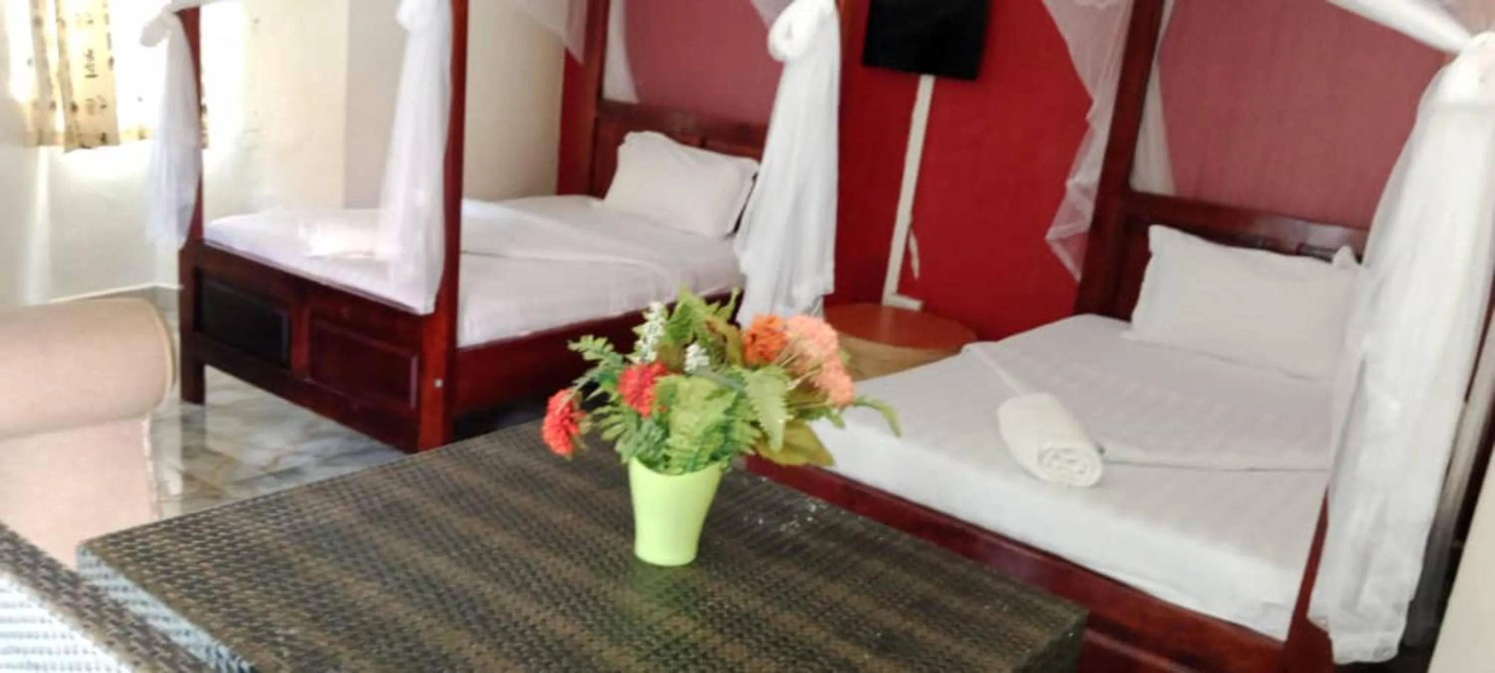 Bed in Gorilla African Guest House