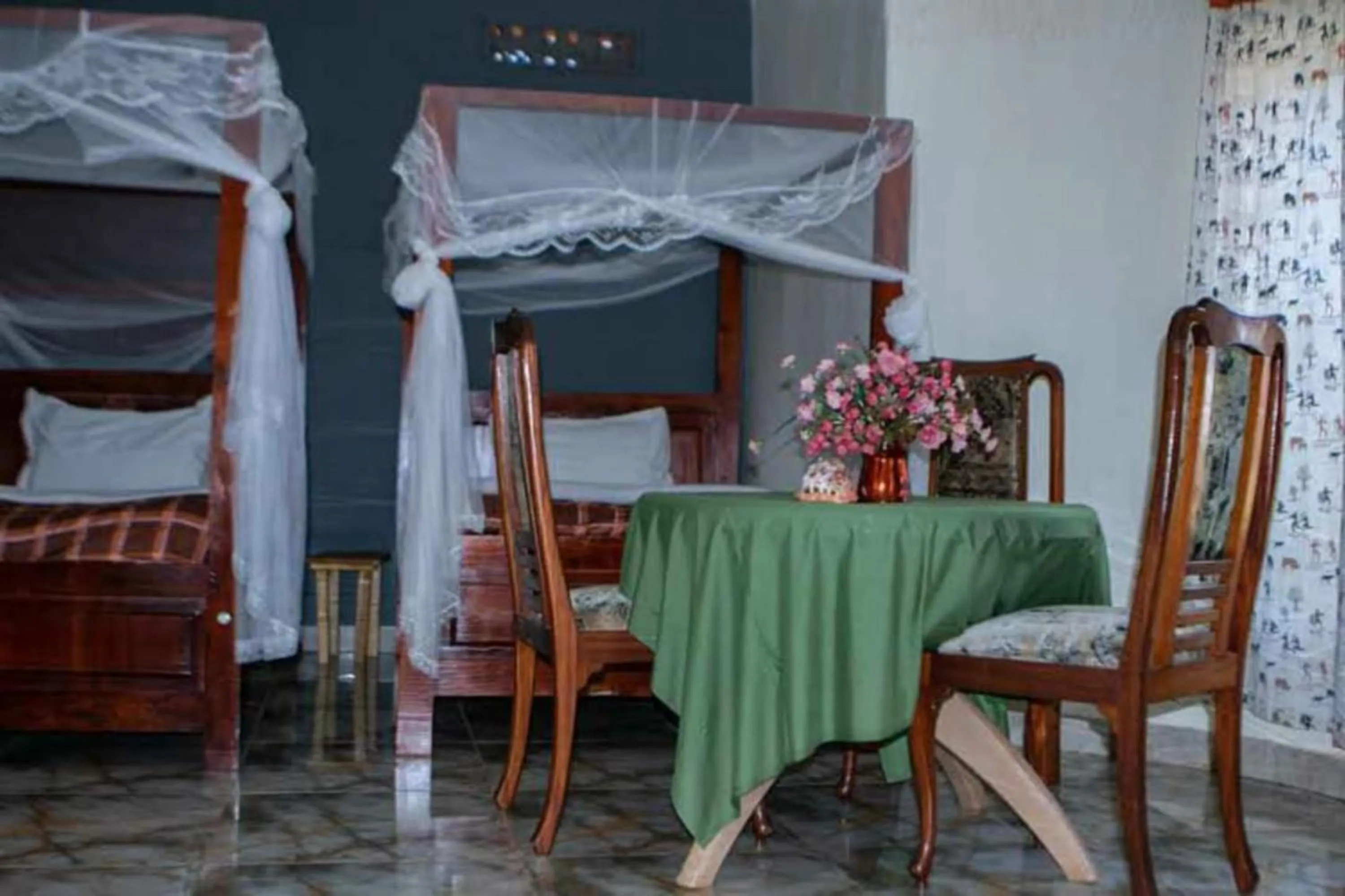 Bed in Gorilla African Guest House