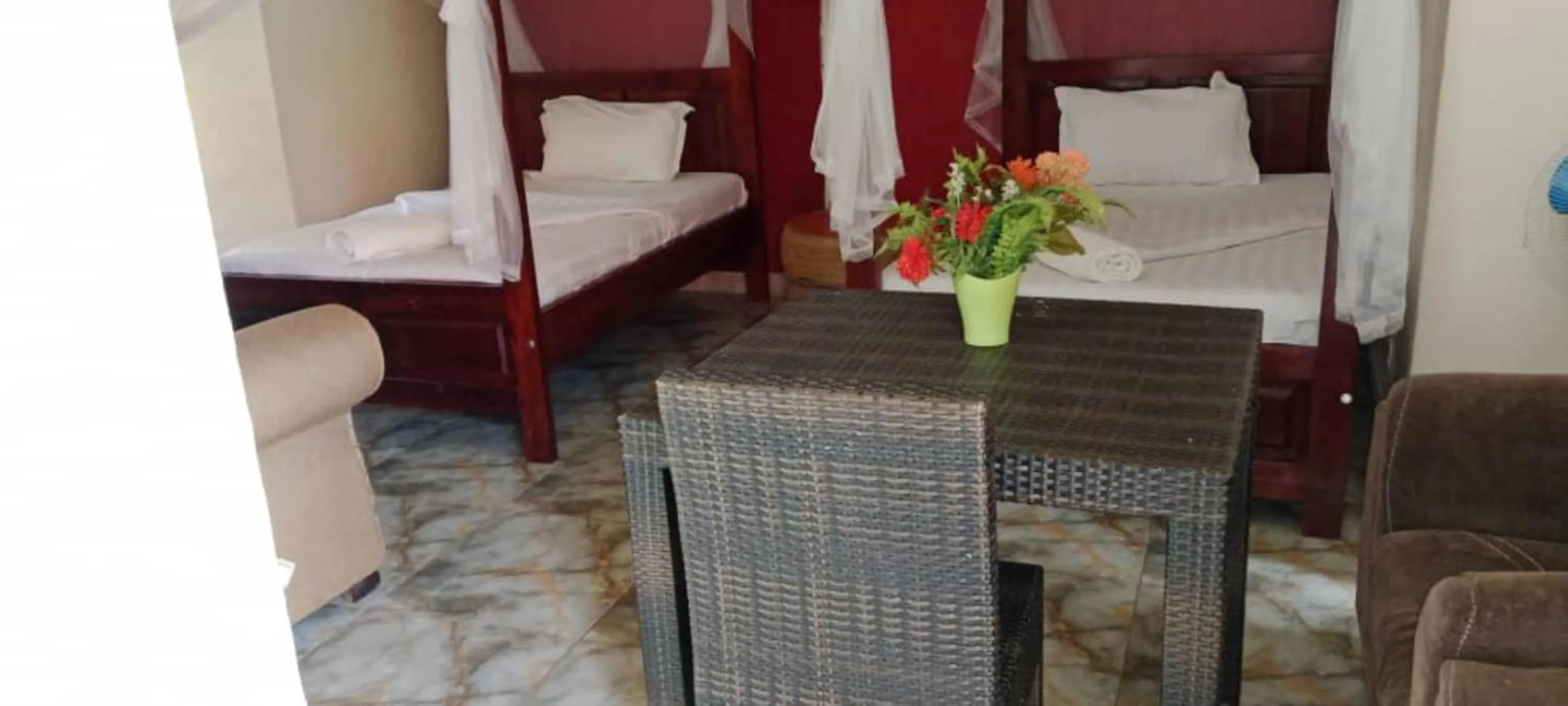 Bed in Gorilla African Guest House