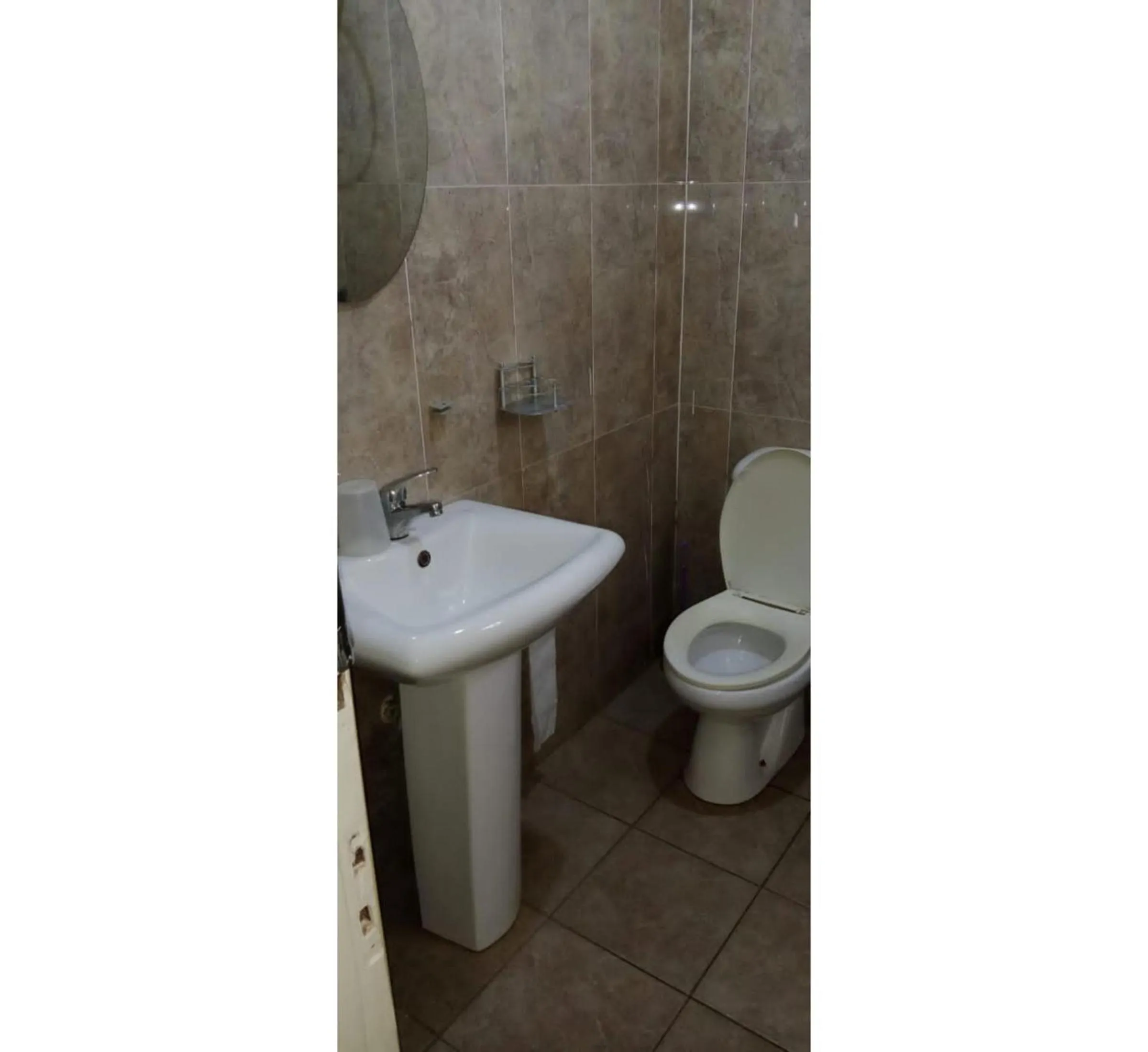 Shower in Gorilla African Guest House