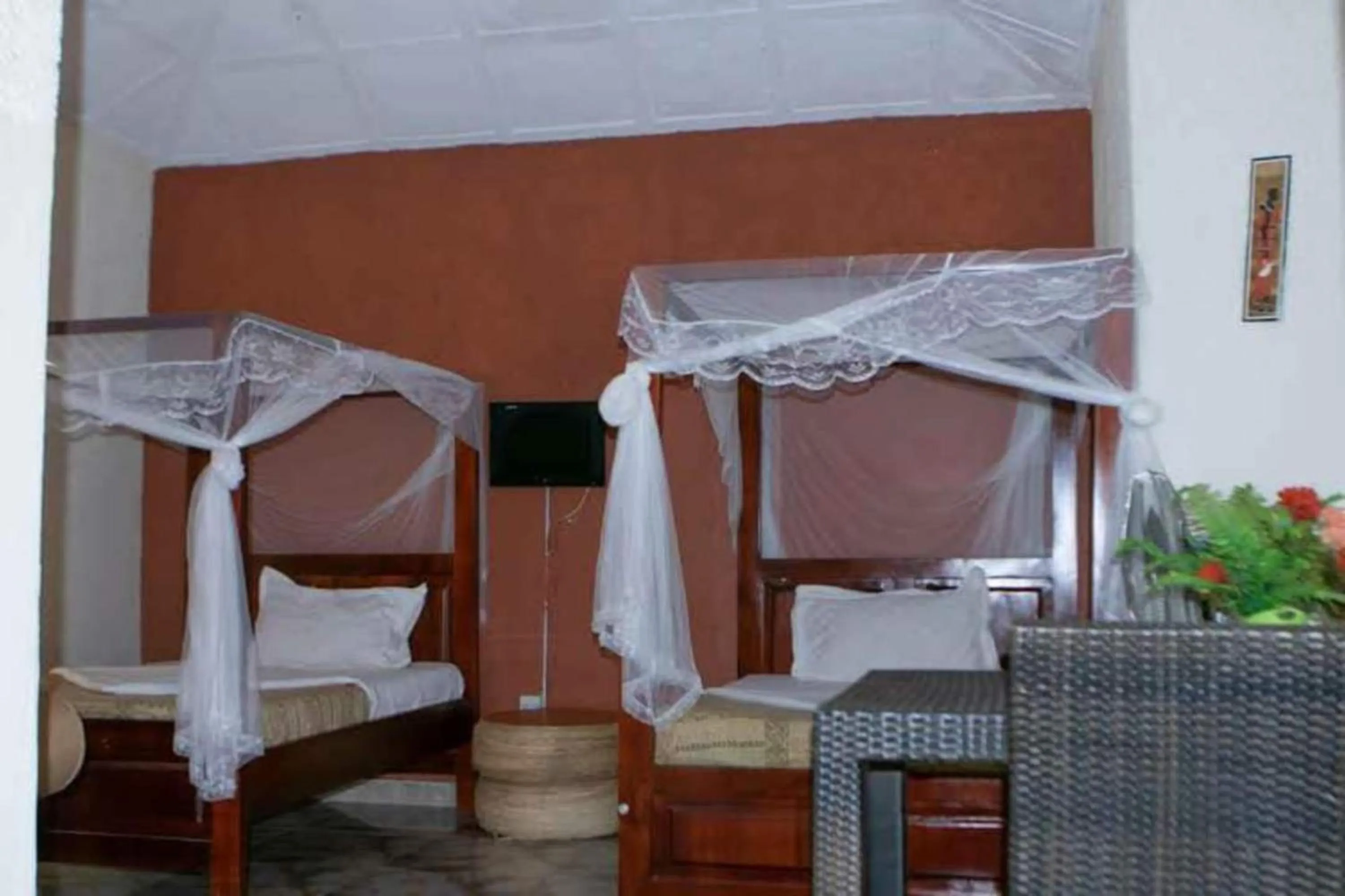 Bed in Gorilla African Guest House