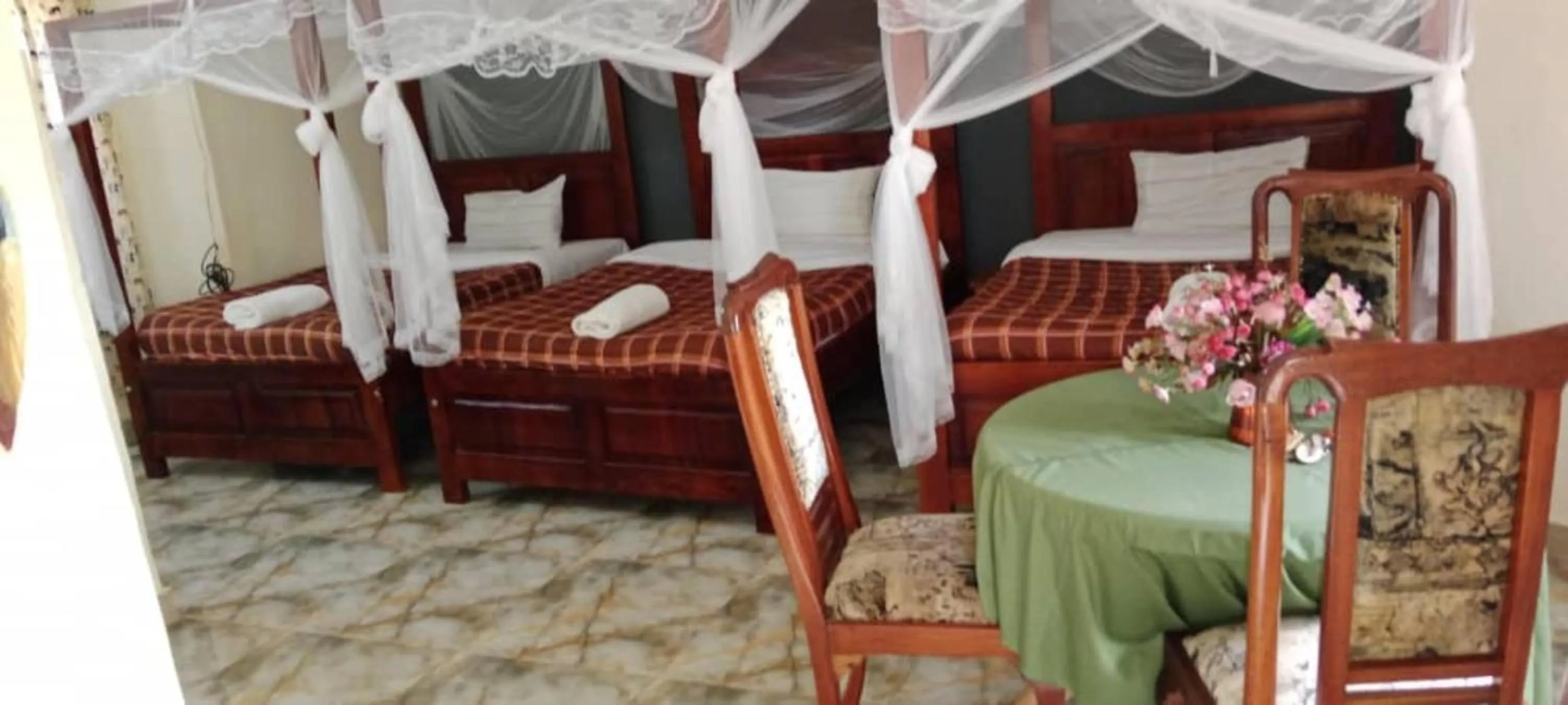 Bed in Gorilla African Guest House