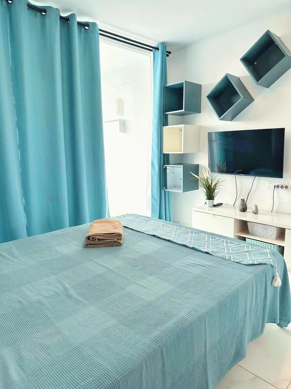 Bed in Sunny Oceanview studio apartment Ponderosa in Costa Adeje