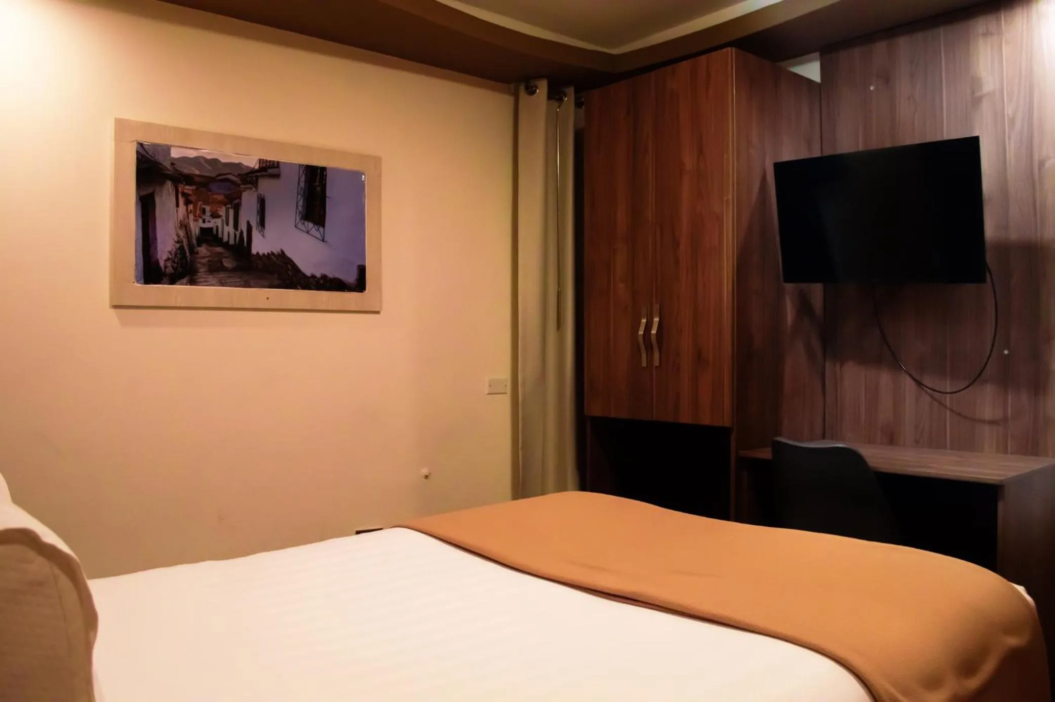 Photo of the whole room, Bed in INKALAM cusco