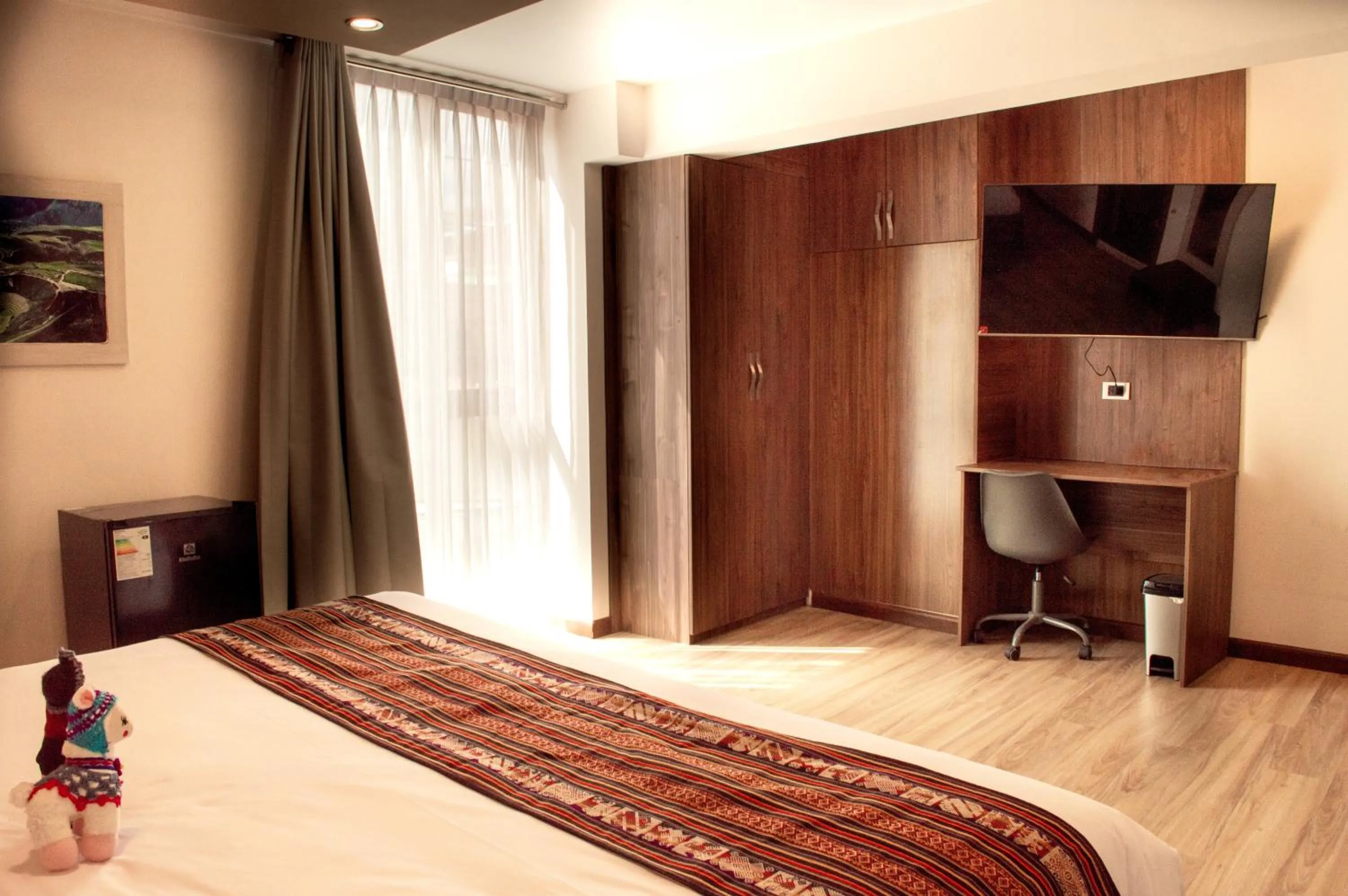 Communal lounge/ TV room, Bed in INKALAM cusco