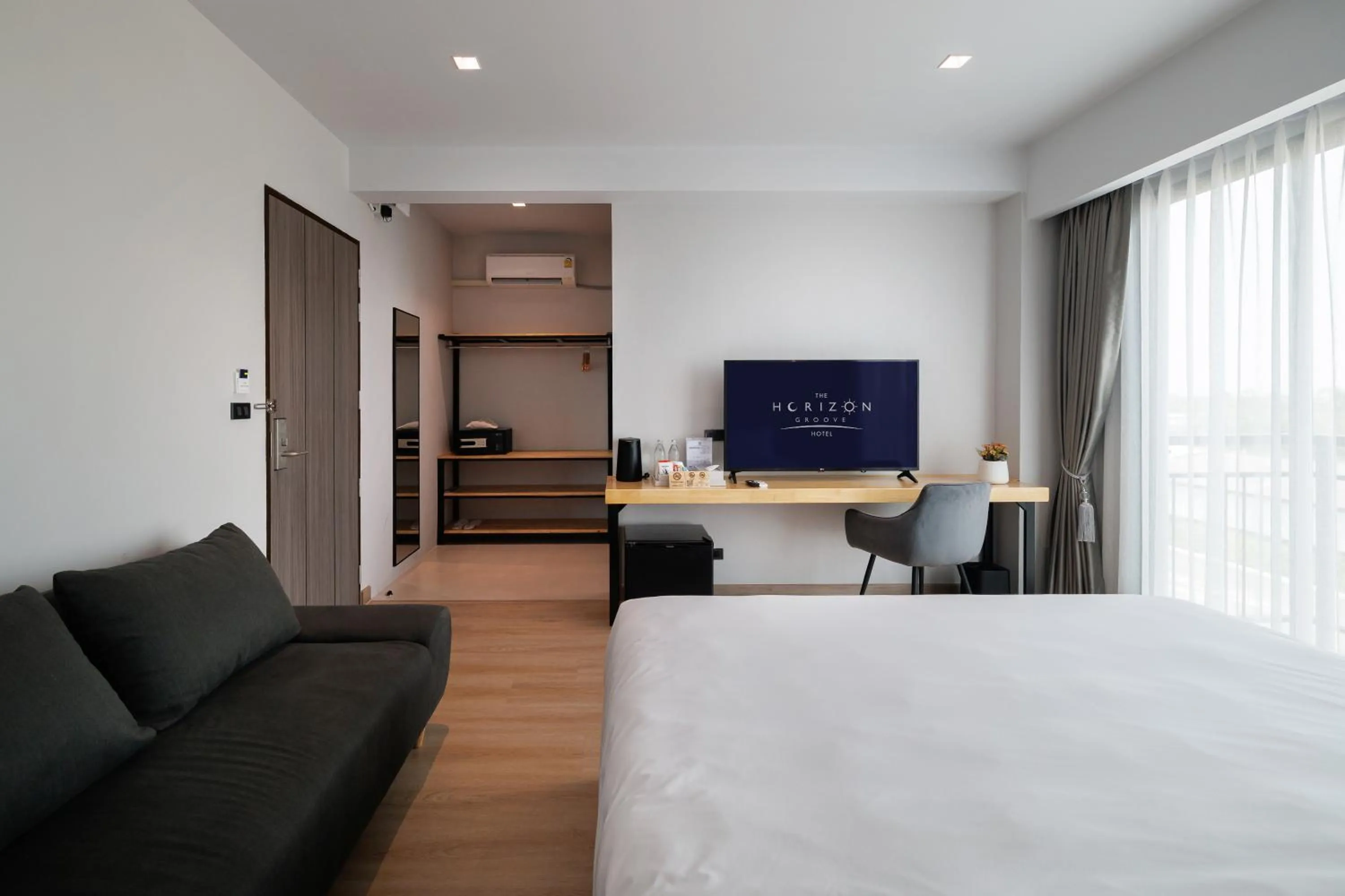 Bed in The Horizon Groove Hotel