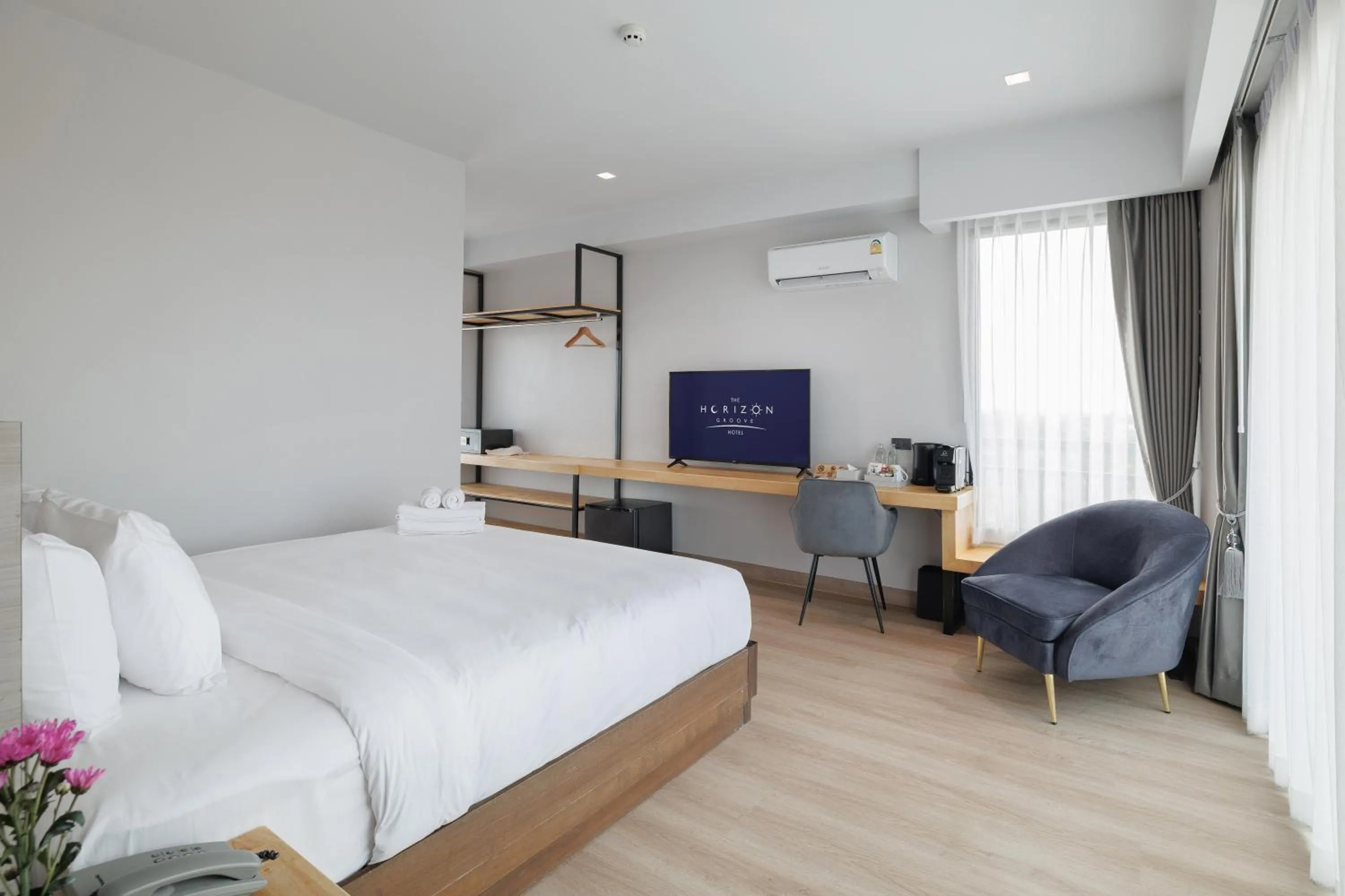 Bed in The Horizon Groove Hotel