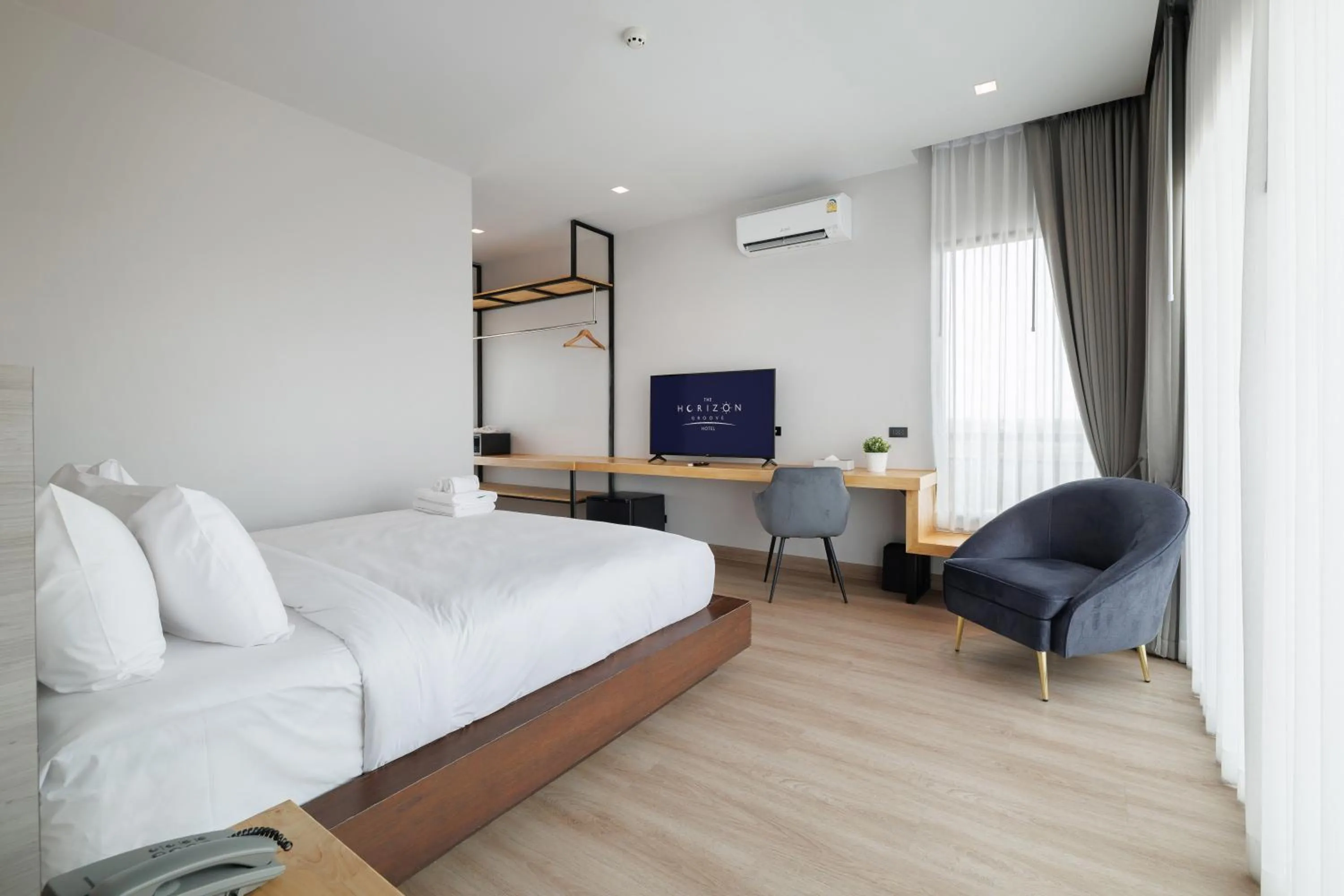 Bed in The Horizon Groove Hotel